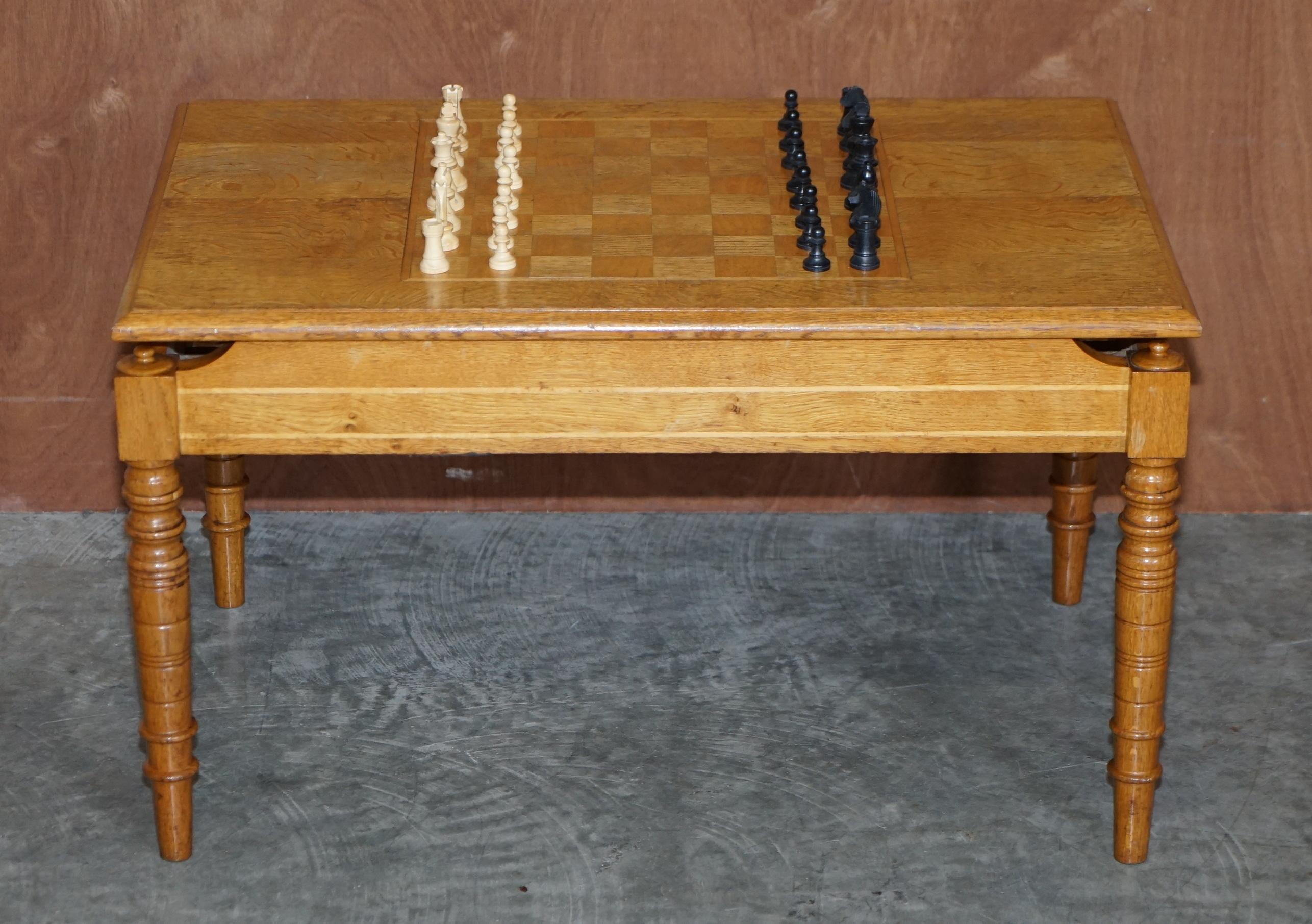 We are delighted to offer for sale this lovely English honey oak vintage chess coffee table with period ebonised chess set

A good looking and well made piece, it can be used as a normal coffee table of course, it has a thick cut oak top and