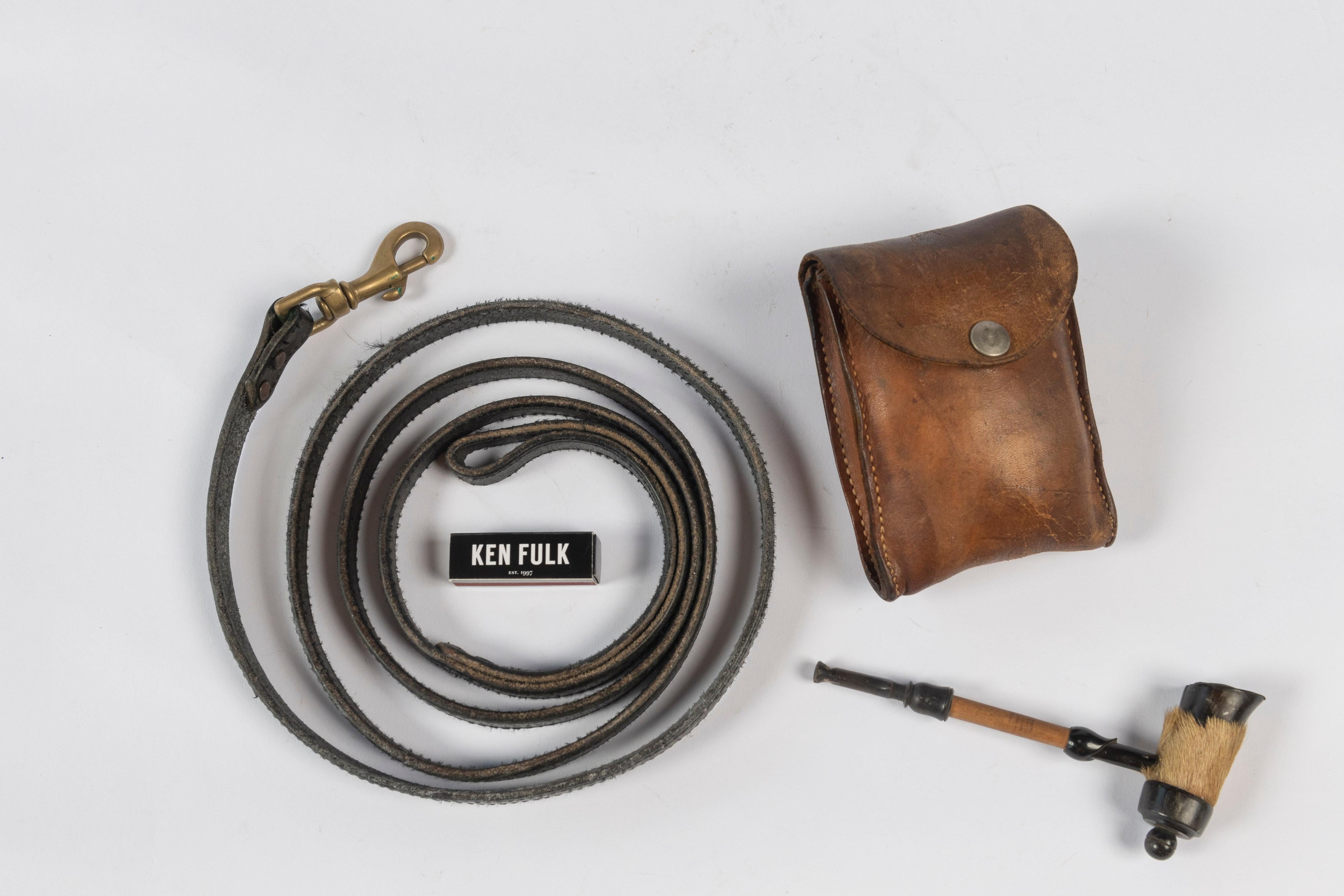 Collection of interesting vintage items sold together including:

Leather Pouch, embossed 