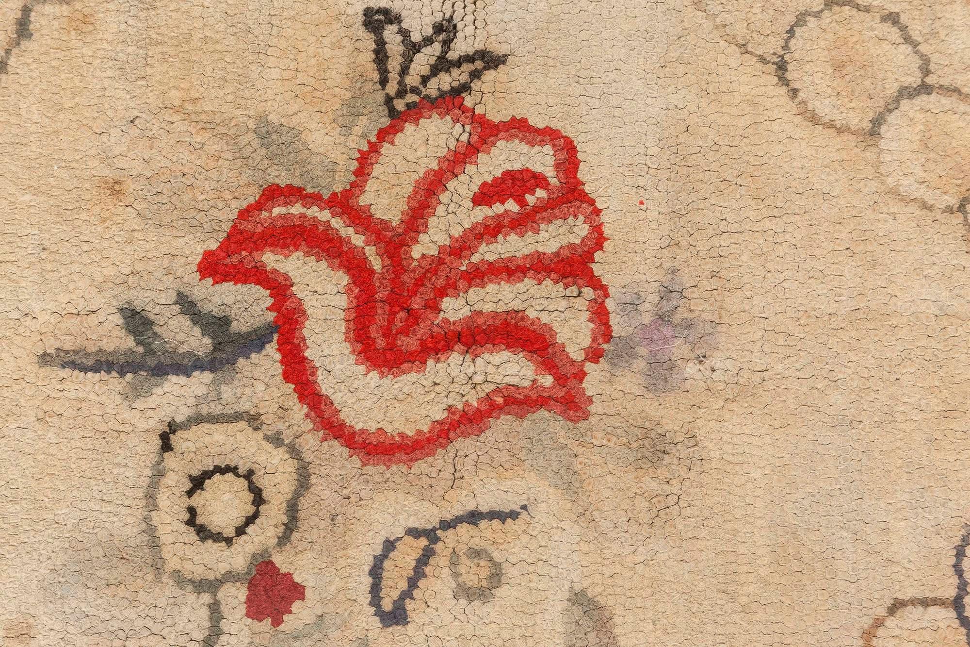 Vintage hooked floral handmade wool rug
Size: 8'9
