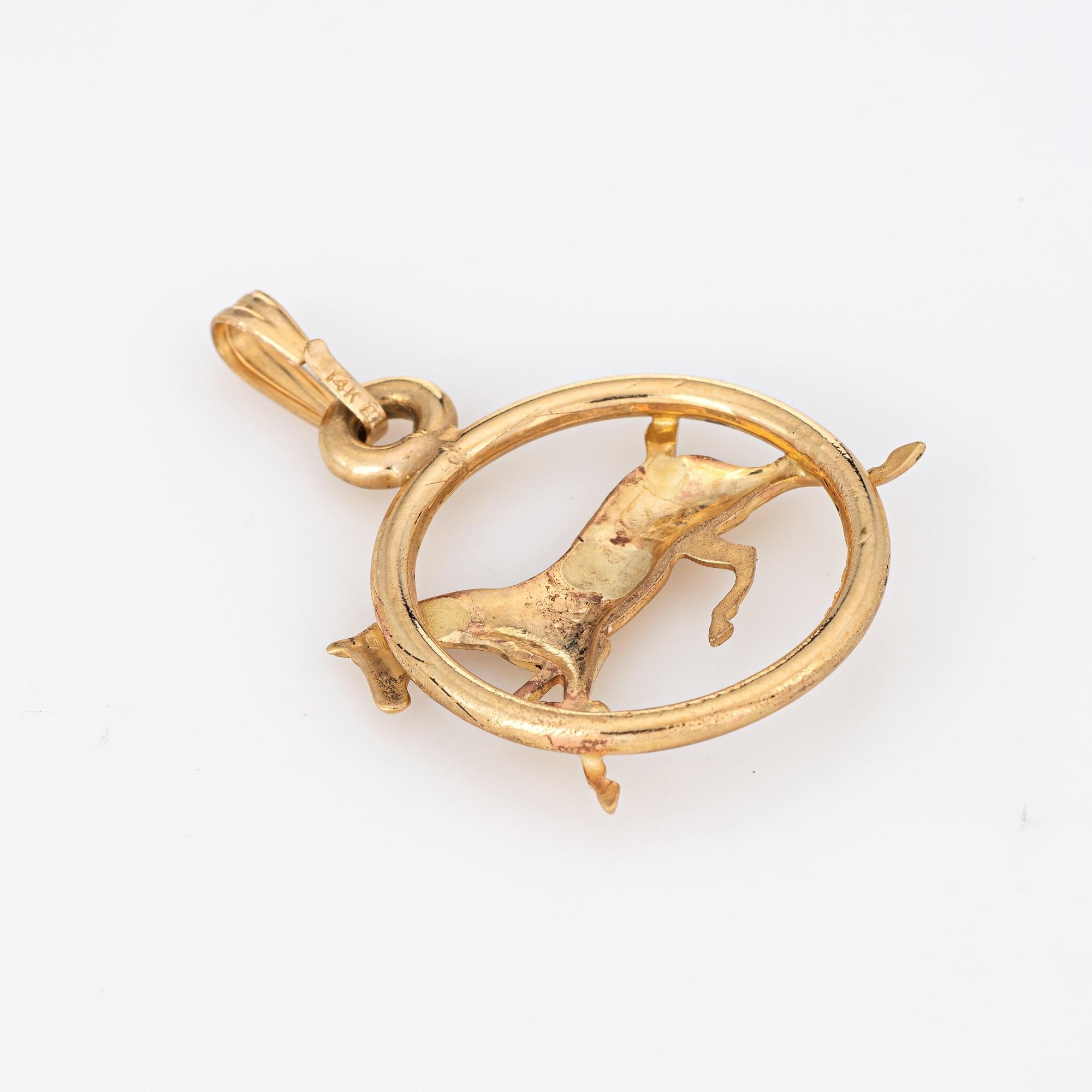 Finely detailed vintage horse charm crafted in 14k yellow gold.  

The sweet charm features a trotting horse set within a circular mount. The piece can be worn as a charm on a bracelet or as a pendant.

The charm is in very good condition and was