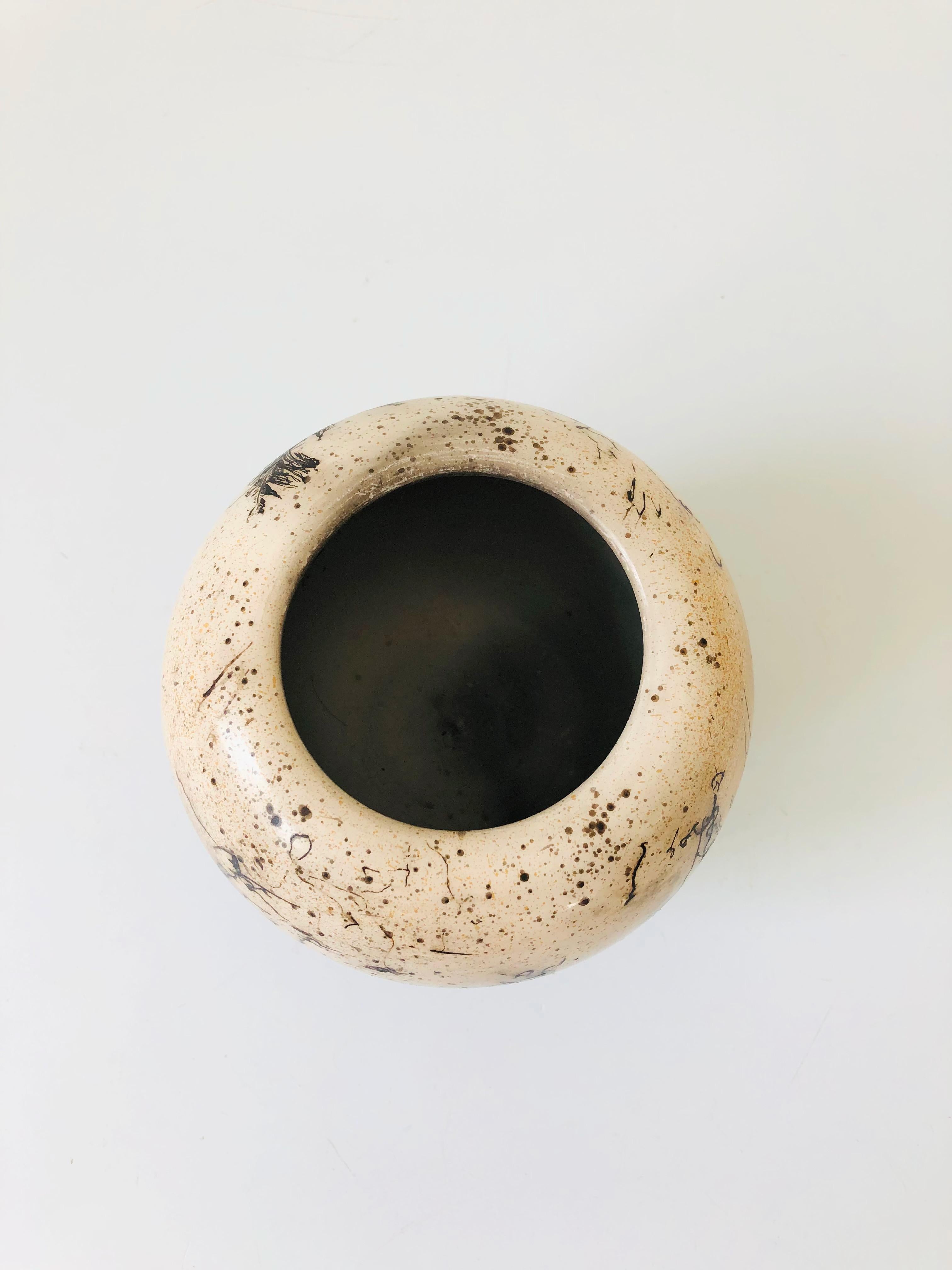 A beautiful vintage horse hair pottery vase. Matte white glaze with a free form horse hair design in dark gray lines. Horse hair pottery is created using the technique of burning real horse hairs into the surface of pottery to create unique