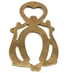 Apribottiglie a ferro di cavallo d'epoca in metallo moderno di metà secolo Breweriana Barware