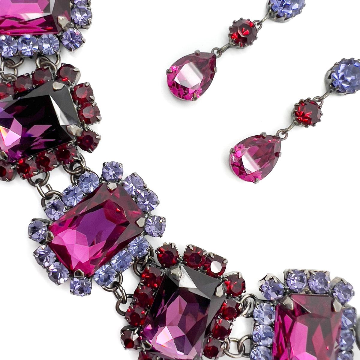 A magnificent Vintage Hot Pink Bracelet with matching drop earrings. Huge, lavish crystals in hot pink create a show stopping Schiaparelli style impact. The earrings perfectly proportioned, leaving the bracelet to steal the show whilst adorning your