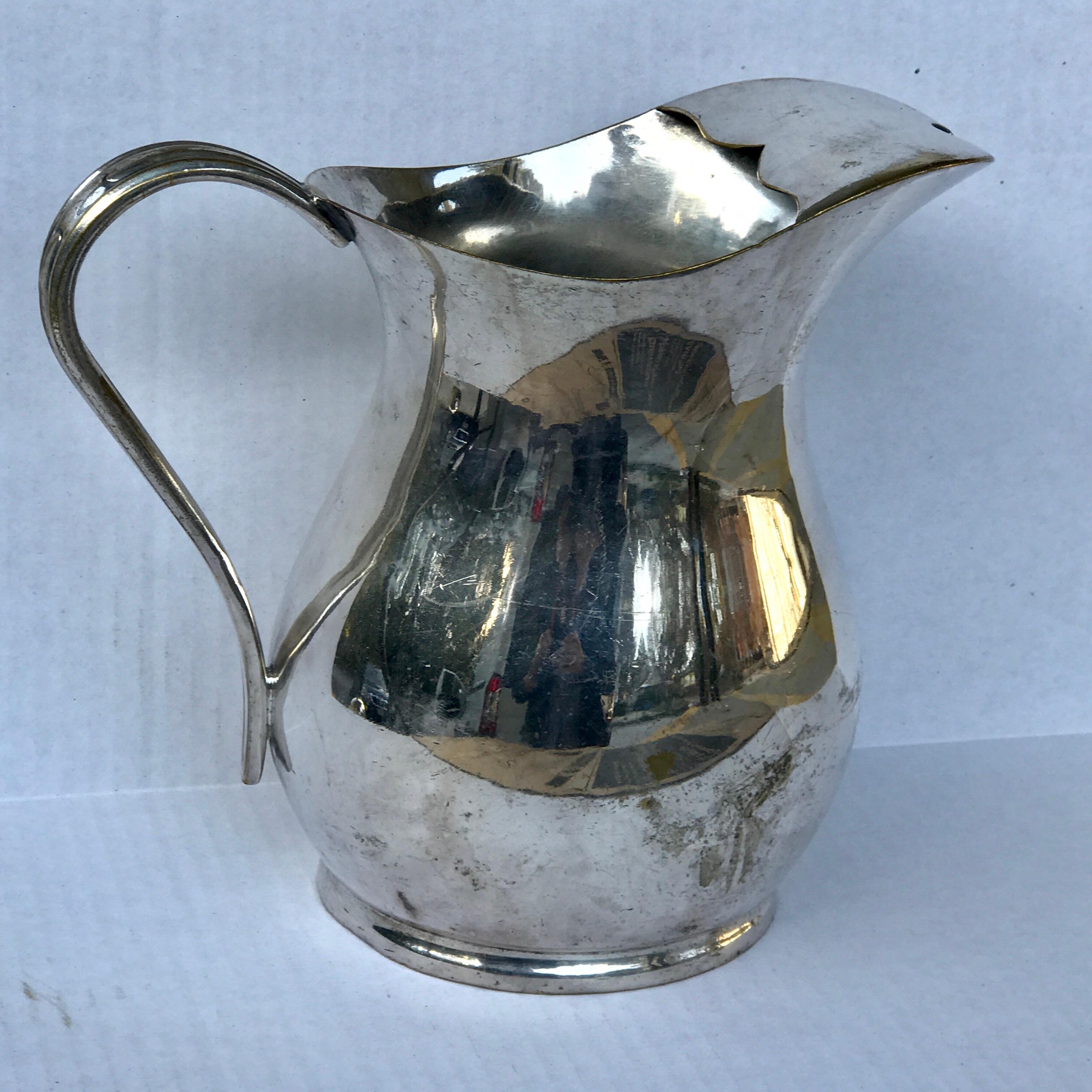 vintage silver plated water pitcher