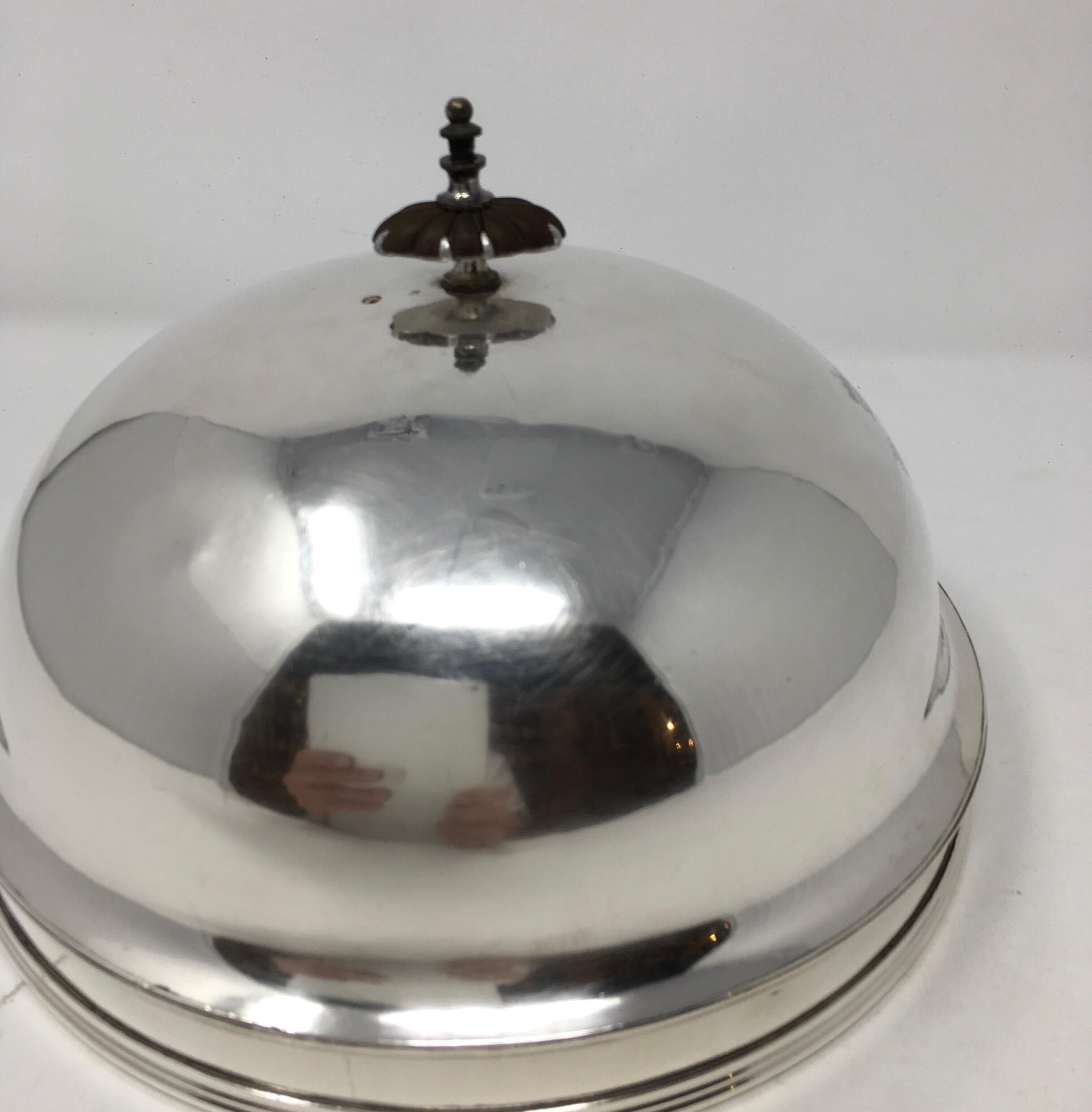 This vintage hotel silver food dome found in France is marked with a crown, dragon and stag as pictured. Beautiful patina with minor wear as expected.