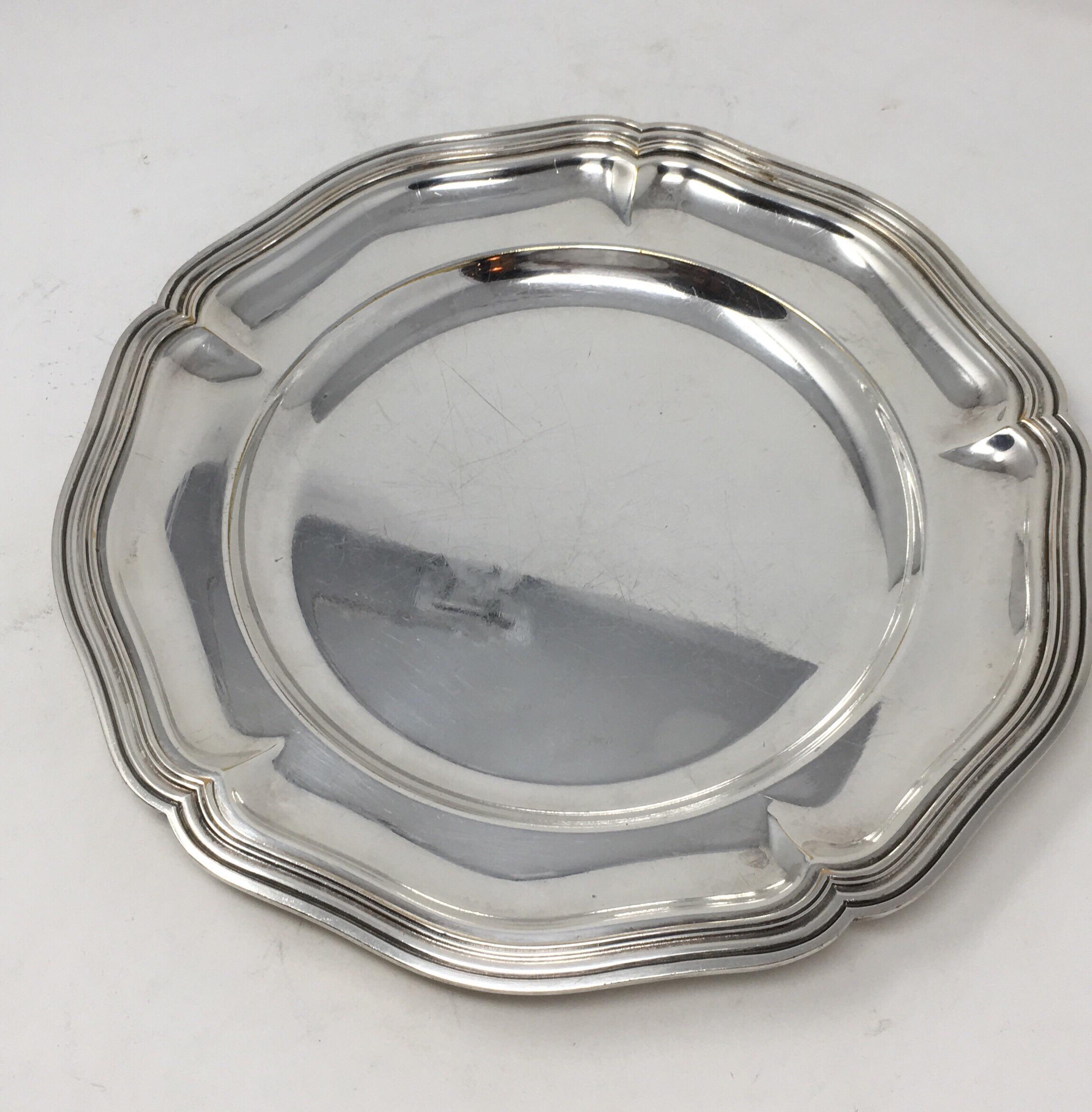 Found in France, this vintage hotel silver serving platter with beautifully detailed edge, has a great aged patina. It would be wonderful in a cabinet and a great addition to your table or buffet.