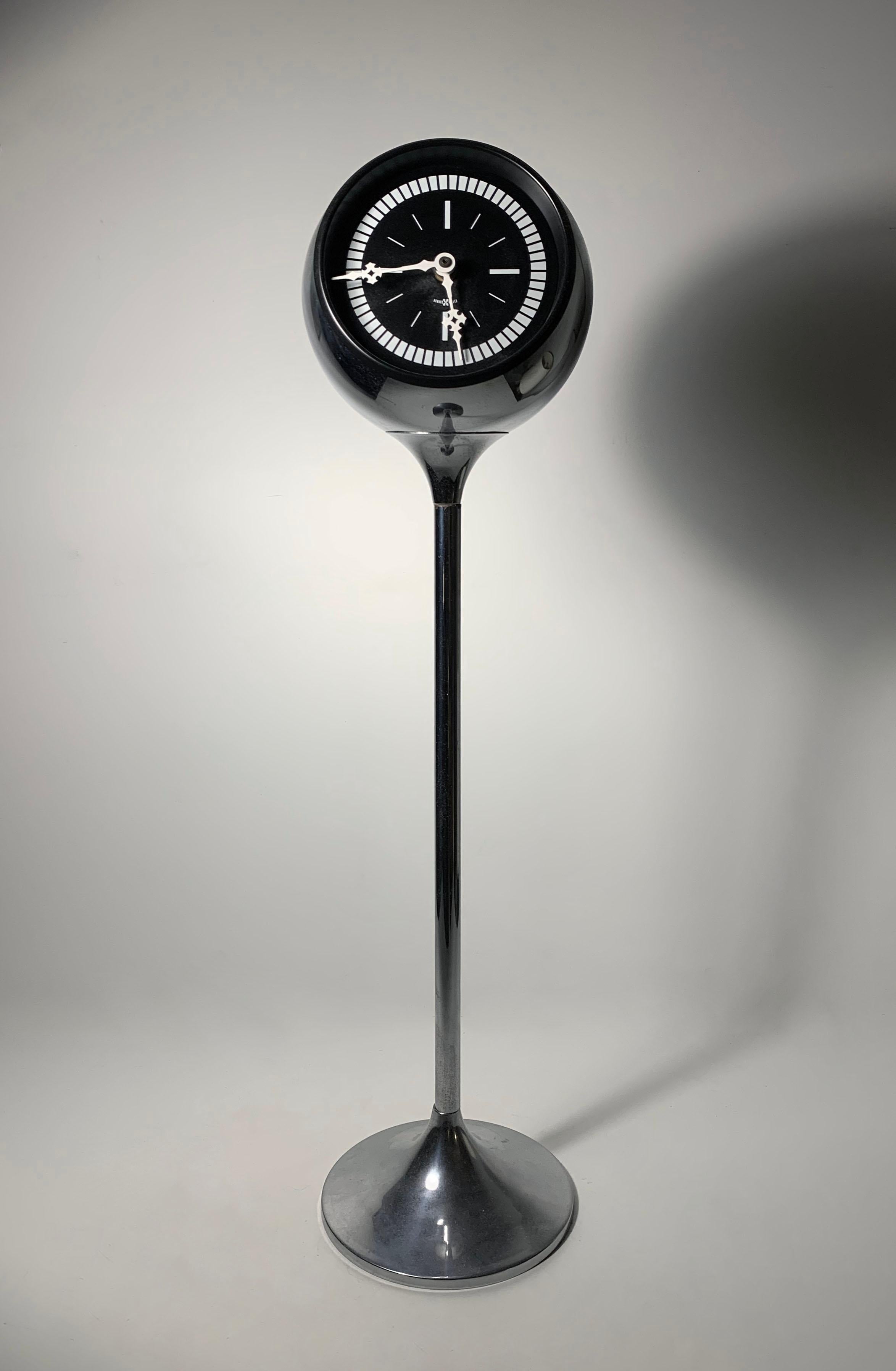 Scarce Vintage Howard Miller Floor or Tall Table Clock attributed to George Nelson.  Model 609. Chrome tulip base, thin chrome stem and chrome spherical top.