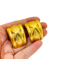 Vintage huge gold designer runway clip on earrings