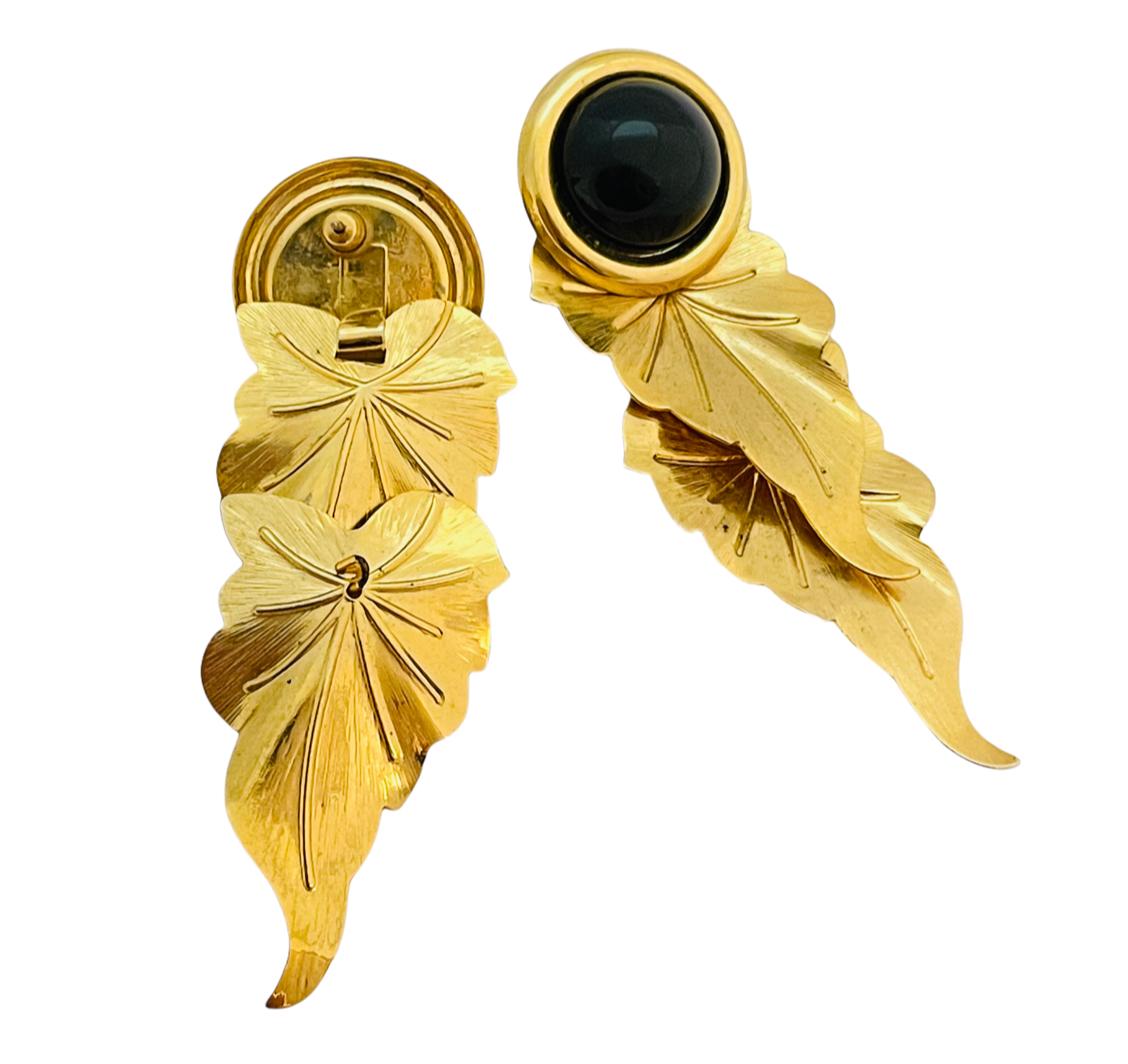 DETAILS

• unsigned

• gold tone with black resin cabs

• vintage designer runway earrings

MEASUREMENTS

• 3.25
