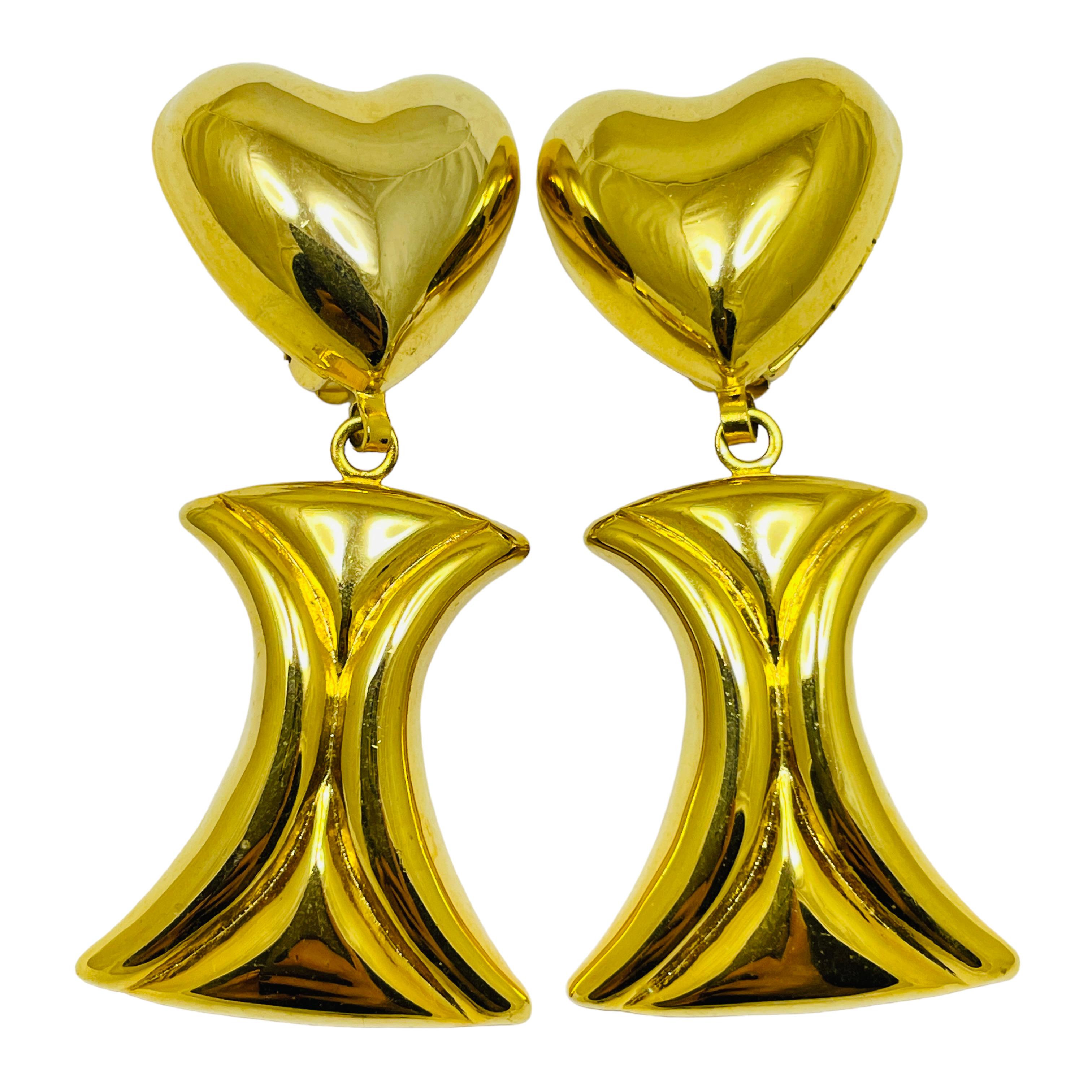 Orecchini a clip vintage anni 
80 con cuore pendente in tonalità oro di design