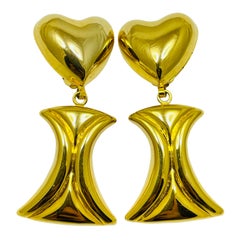 Orecchini a clip vintage anni 
80 con cuore pendente in tonalità oro di design