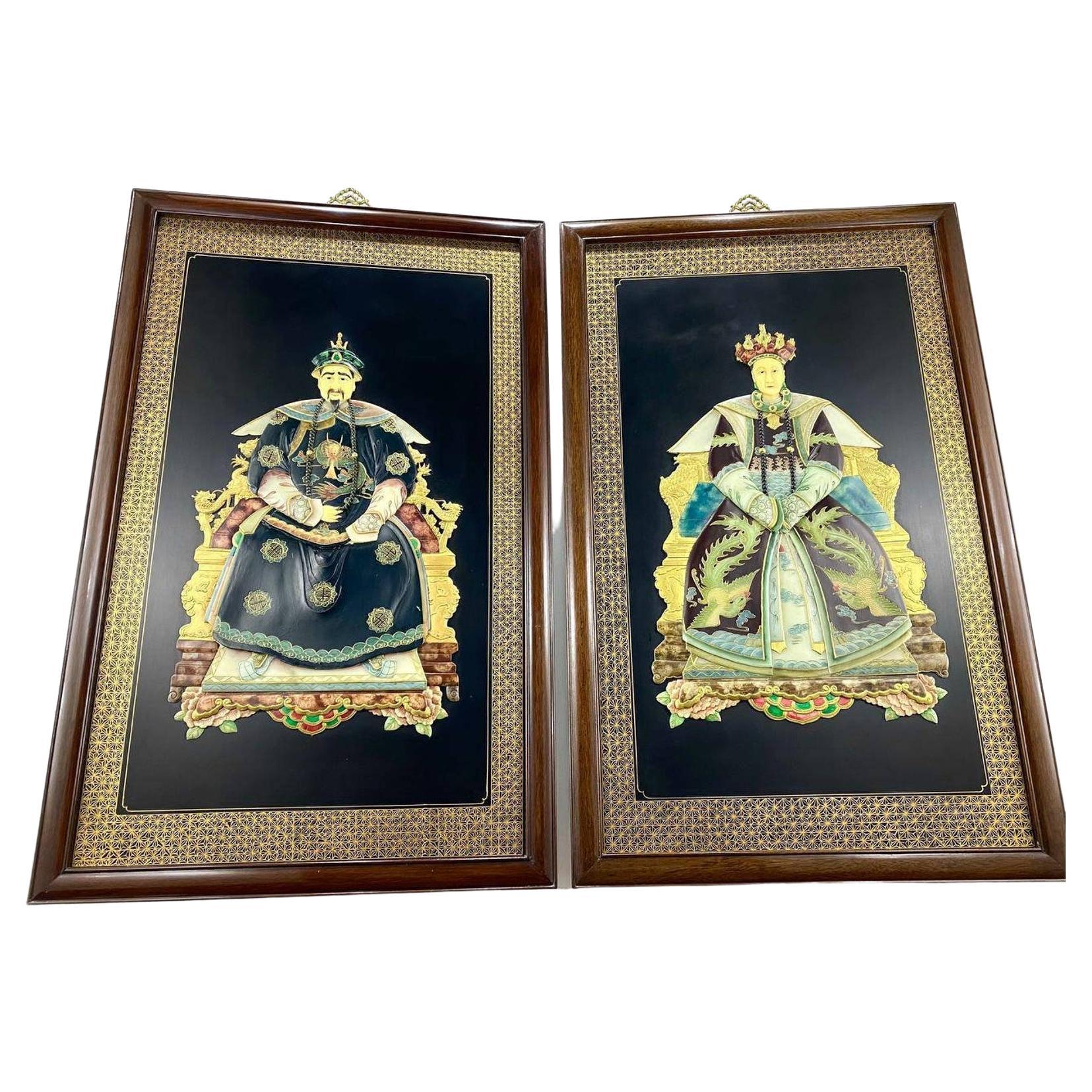 This is a spectacular set of hand-painted wooden wall panels in chinoiserie style representing the Emperor and Empress of the Qing Dynasty. 

 Hand-carved jade stone and hand-painted figures depict dignified Chinese ancestors in classic Ming style