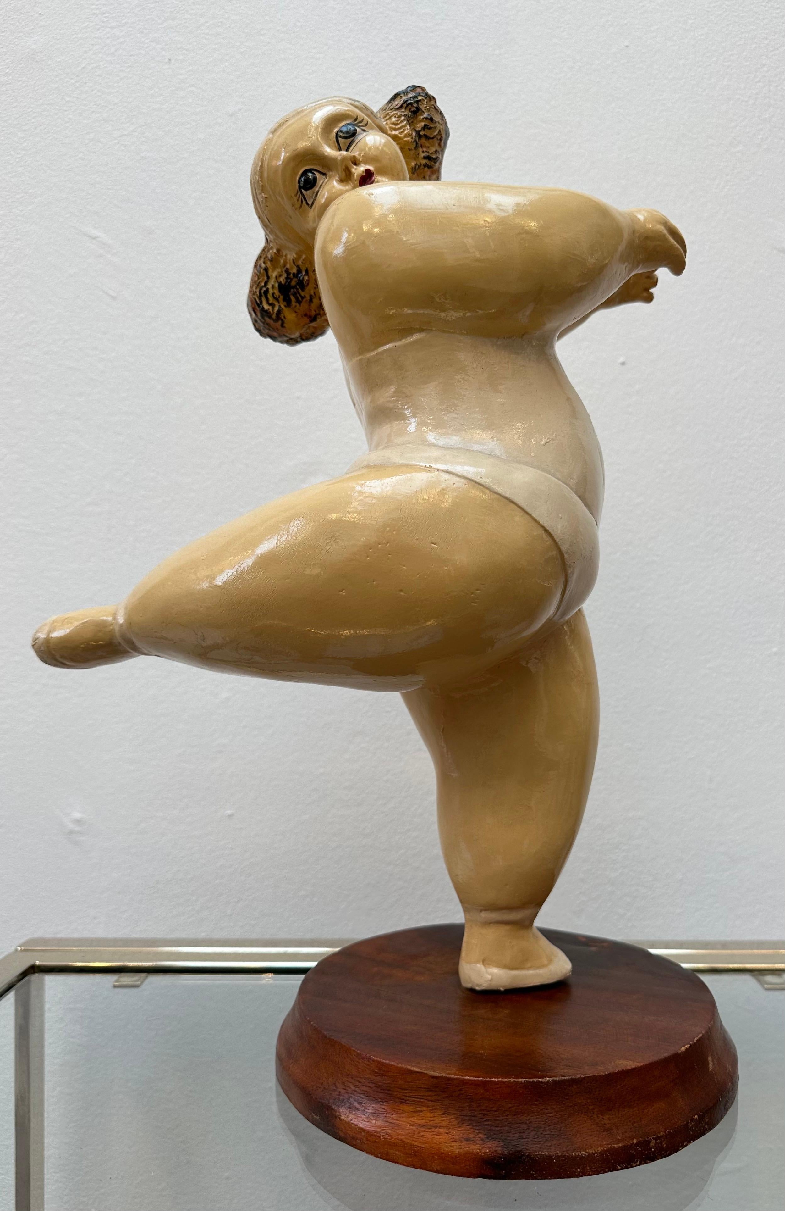 A fun decorative figurine of a dancing full-figured ballerina in the Á deux bras position with both arms in the forward position. I have been unable to exactly identify its provenance but it dates to late 1960s/70s in Scandinavia perhaps Sweden. The
