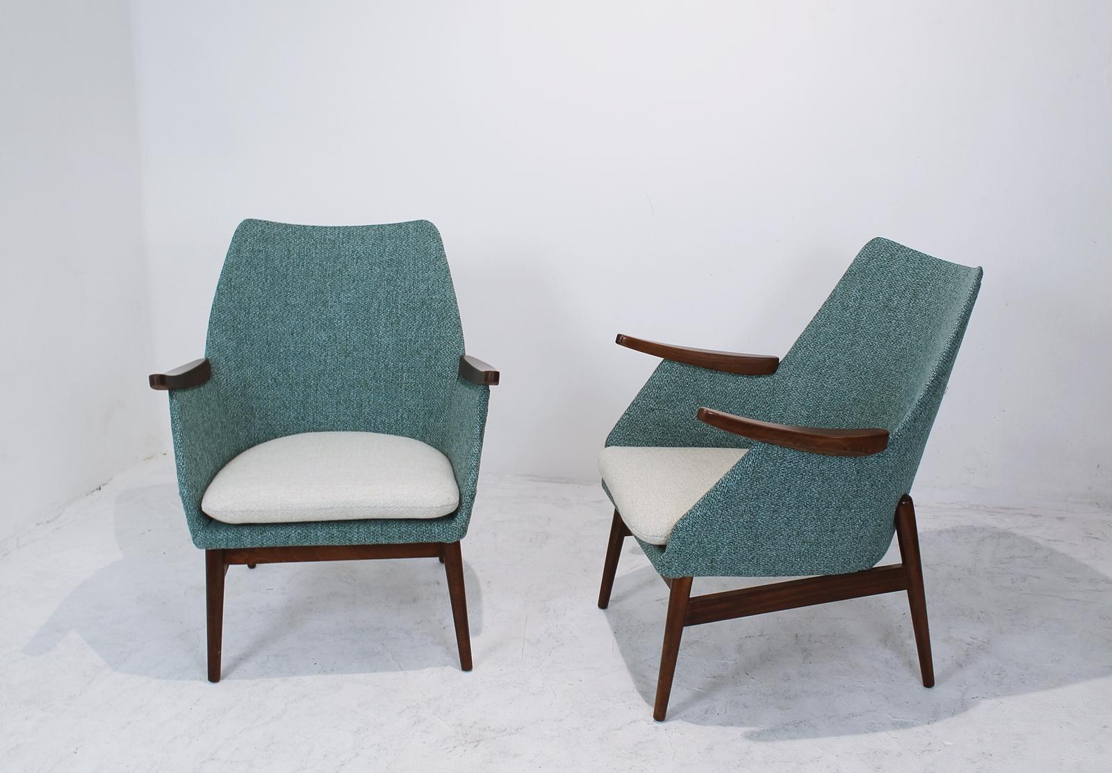 1960s vintage Hungarian cocktail chairs, totally refurbished .

This pair of midcentury chairs are simply delightful. They bring instant history and sleekness to any environment.

They are made in East Europe and are typical of this era. 
Price per