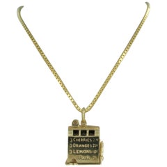 Vintage i14k gold necklace with a slot machine-shaped pendant - 16.8 grams