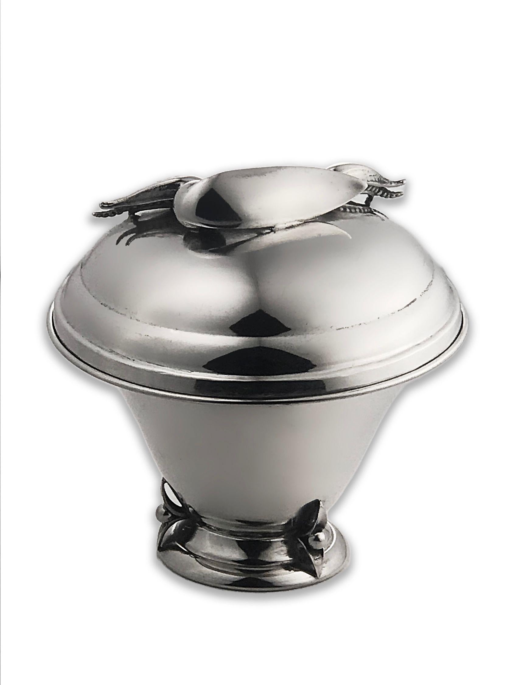 Awesome Mid-Century Modern Iconic Sterling Silver covered dish by renowned Canadian Silversmith Carl Poul Petersen The lid adorned with Blossom or Pea Pod like Flowers. Handcrafted; No monograms or engraving. Signed 