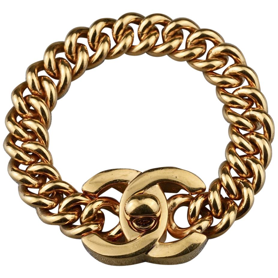 Vintage Chanel Chanel Logo Charms Turnlock Bracelet Gold Metal – Madison  Avenue Couture