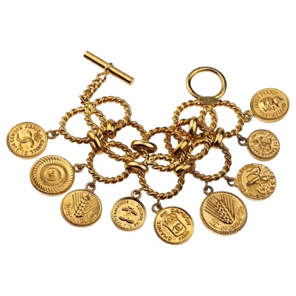 Vintage ICONIC CHANEL Logo Coin Medallion Charm Hoop Chain Bracelet For  Sale at 1stDibs