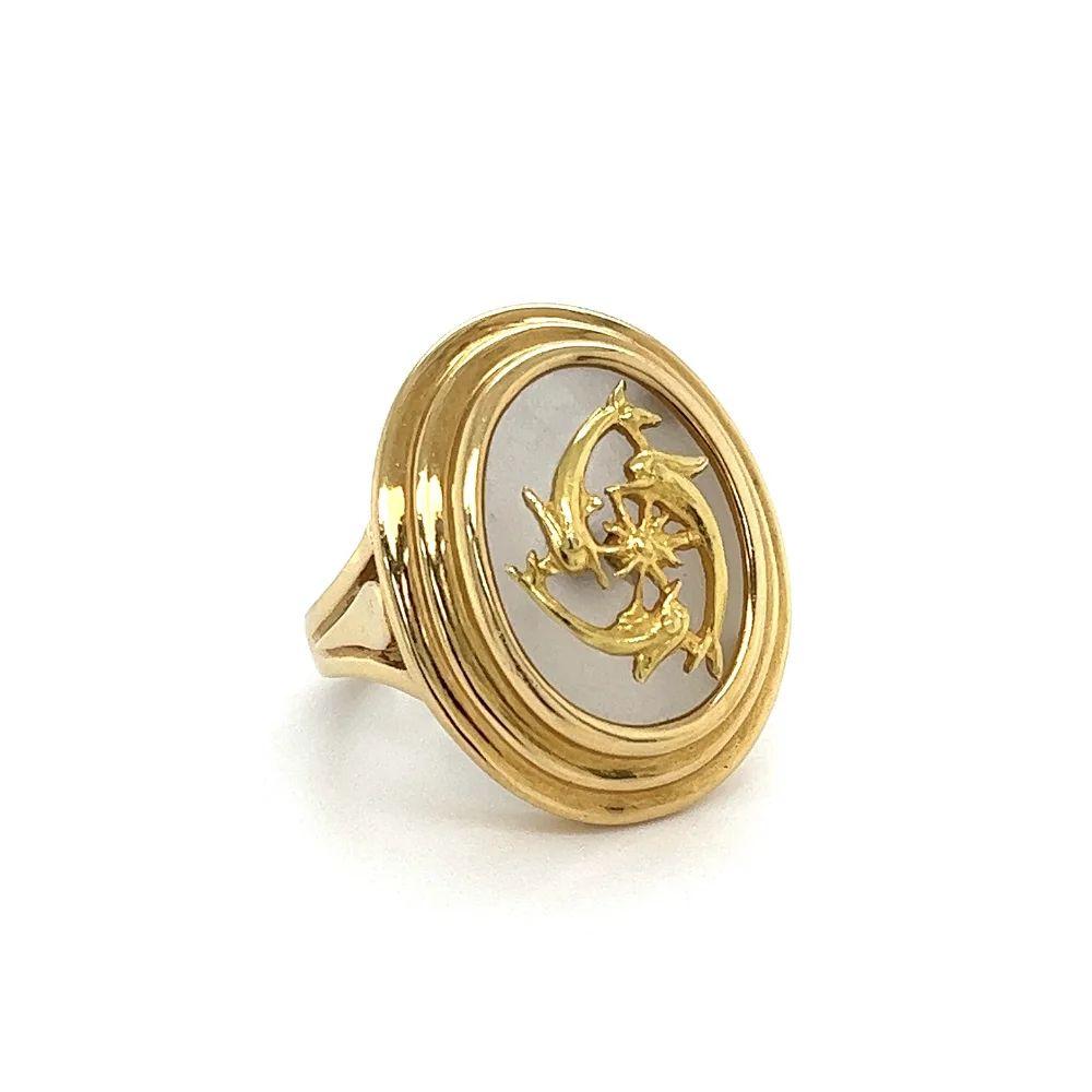 Simply Beautiful! Vintage Lalaounis Iconic Dolphins on a Rock Designer Gold Ring by Ilias Lalaounis. Hand crafted 18K Yellow Gold. Ring size 7.255. Marked: A21 GREEK 750. Approx. weight 14.5 grams. Classic and Chic…Sure to be admired! Ilias