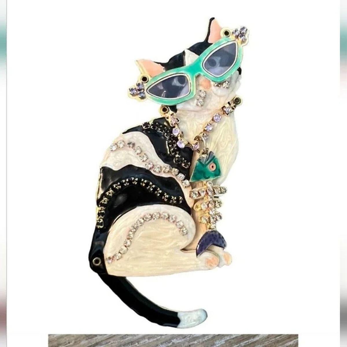 Simply Beautiful! Oscar worthy Iconic LUNCH AT THE RITZ Signed Crystal and Enamel Whimsical Kitty Cat Brooch. The Enamel and Crystal embellished Show Stopper Brooch features a Kitty Cat with a swinging tail and wearing Sunglasses. What Fun! Gold