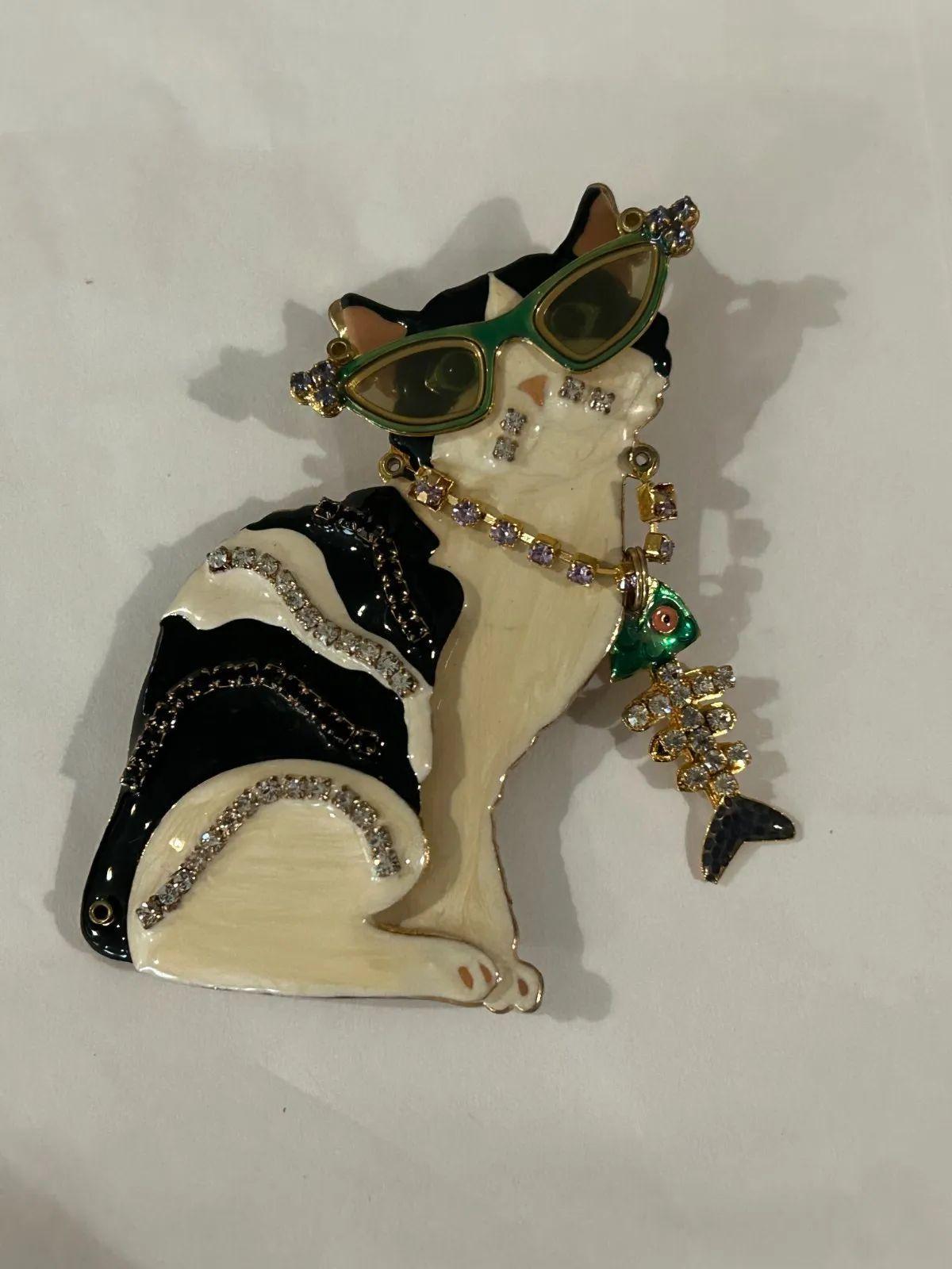 Simply Beautiful! Oscar worthy Iconic LUNCH AT THE RITZ Signed Crystal and Enamel Whimsical Kitty Cat Brooch. The Enamel and Crystal embellished Show Stopper Brooch features a Kitty Cat with a swinging tail and wearing Sunglasses. What Fun! Gold