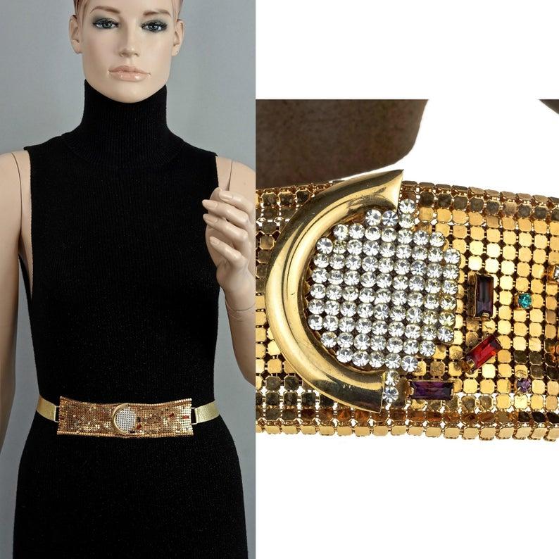 Vintage IDEMARIA Jewelled Mesh Gold Belt - Owned by LIZA MINNELLI (documented)

Measurements:
Buckle Height: 1.77 inches (4.5 cm)
Buckle Width: 7.08 inches (18 cm)
Length: 51.57 inches (131 cm)

Owned by Hollywood Legend - Liza Minnelli (documented)