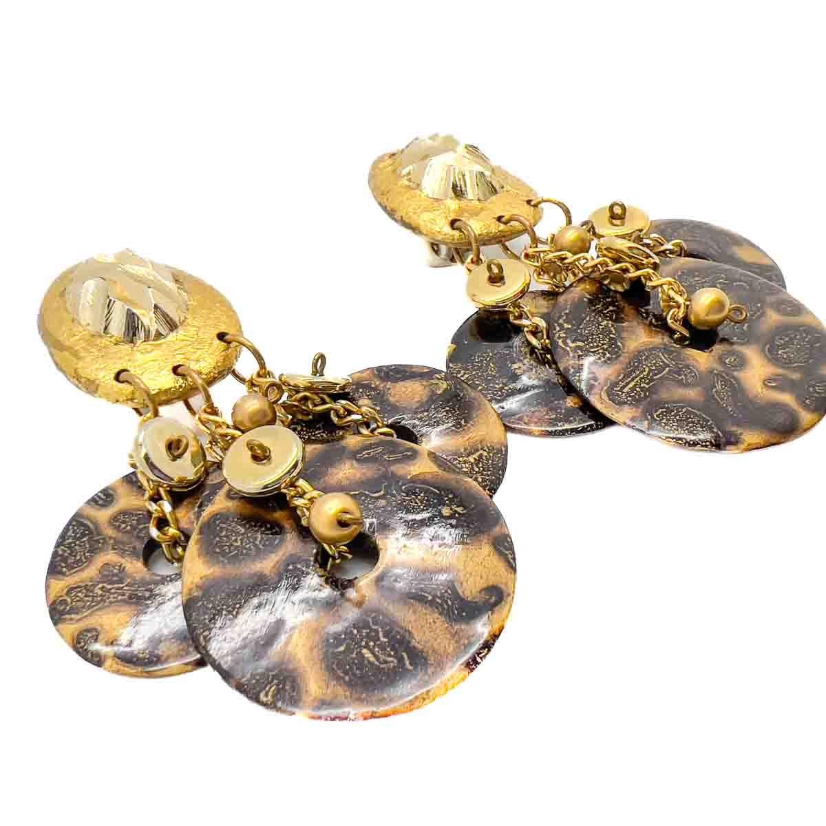 A pair of Vintage Ikarami Leopard Print Statement Earrings. Exotic golds and animal print browns and bronzes adorn these statement hand made earrings by Ikarami. The perfect accessory for timeless style.

Vintage Condition: Very good without damage