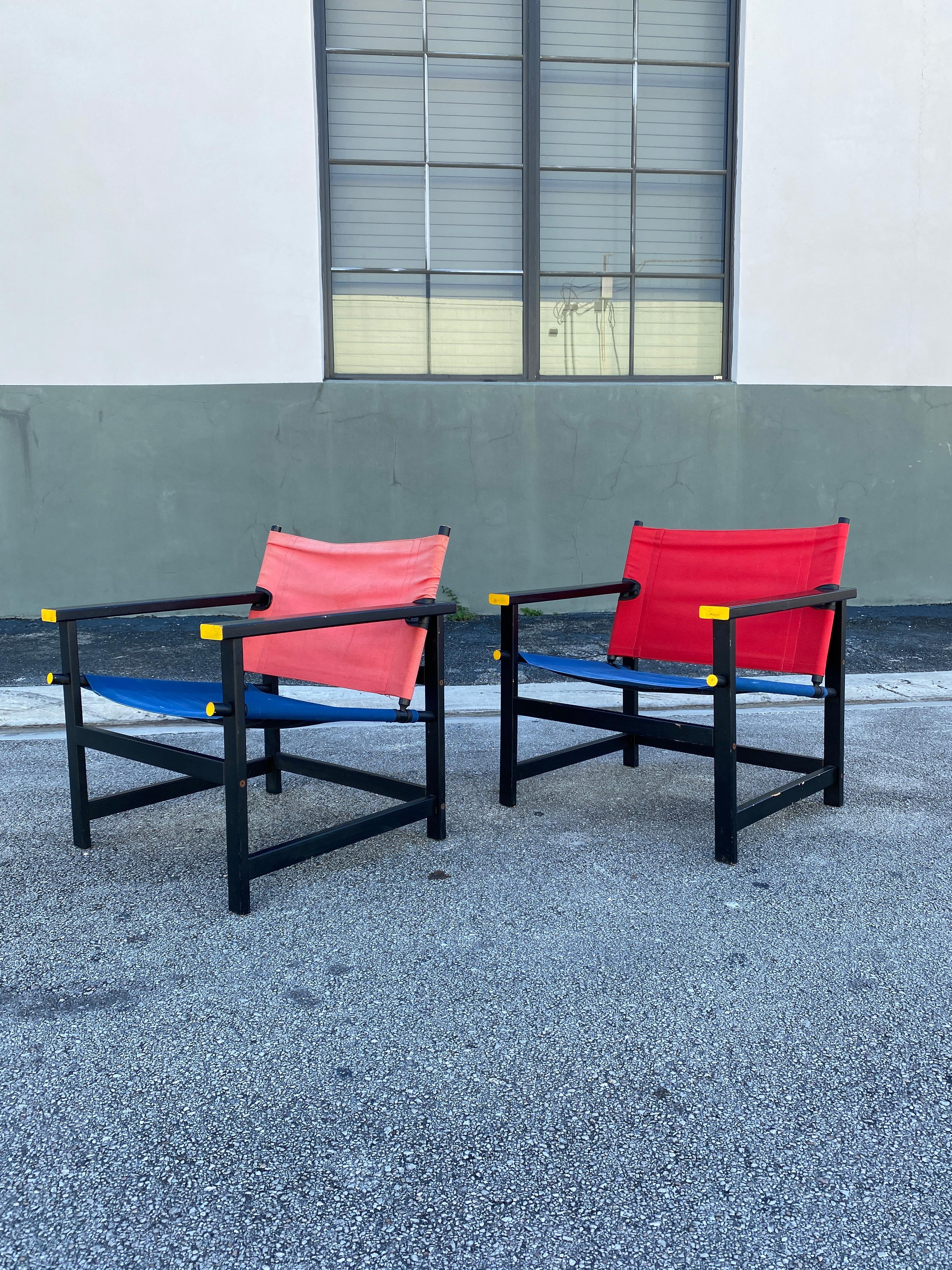 Vintage Ikea sling chairs in the style of Mondrian in read and blue canvas. The original design was created in 1918 with the dutch De Stijl art and architecture movement founded by Piet Mondrian and Theo van Doesberg in 1917 based upon strict ideals