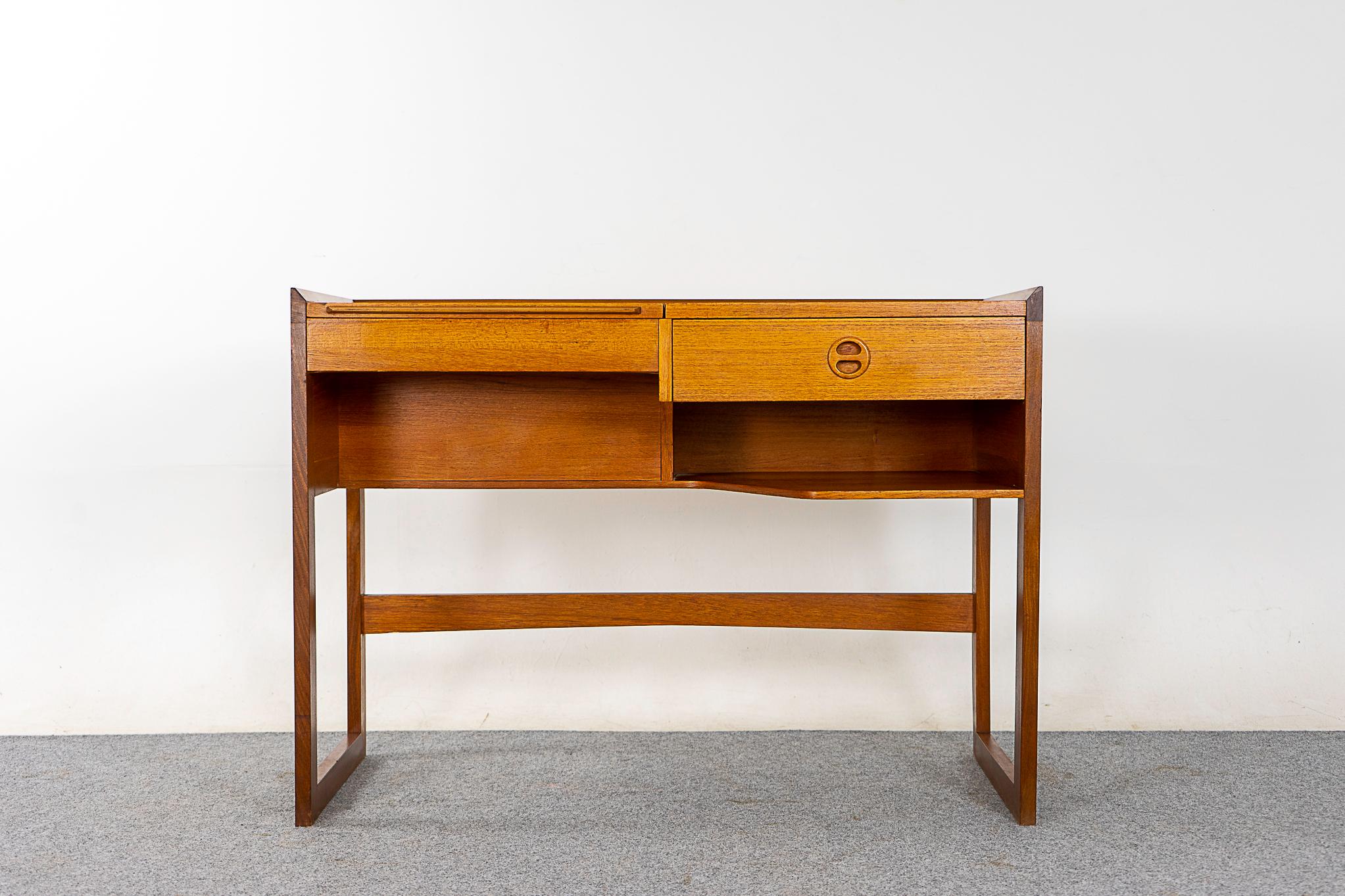 Teak vanity by Arne Wahl Iversen for Ikea, circa 1960s. Compact vanity with solid wood trim and dovetail construction. Platform lifts to reveal mirror and fitted interior storage.

Unrestored item, some marks consistent with age.

Please inquire for
