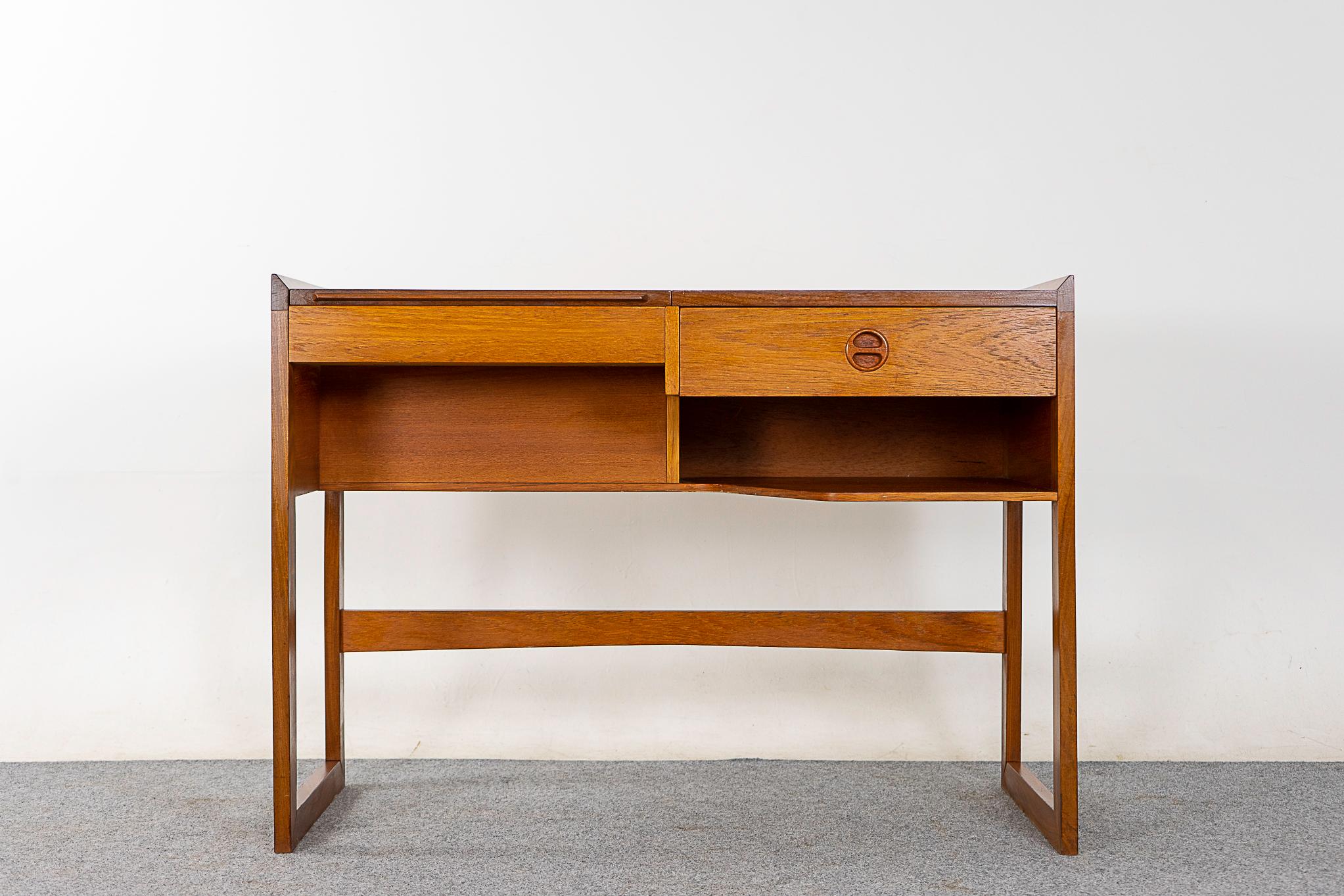 Teak vanity by Arne Wahl Iversen for Ikea, circa 1960s. Compact vanity with solid wood trim and dovetail construction. Platform lifts to reveal mirror and fitted interior storage.

Unrestored item, some marks consistent with age.

Please inquire for