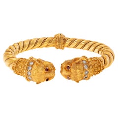 Vintage Ilias Lalaouinis for Zolotas, yellow gold Chimera heads bangle bracelet