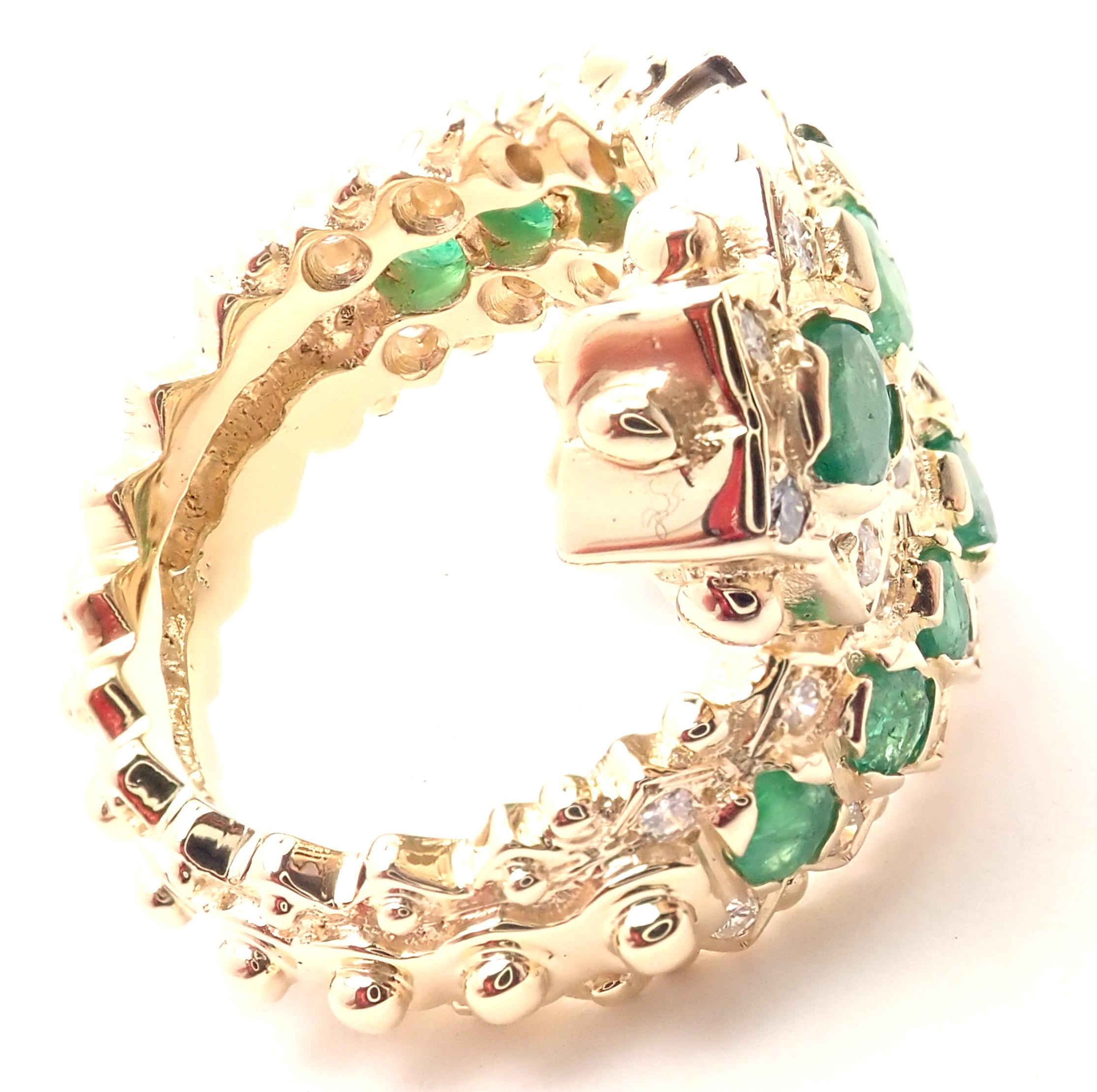 Vintage 18k Yellow Gold Emerald & Diamond Band Ring by Ilias Lalaounis. 
With 34 round brilliant cut diamonds and 14 round emeralds
Details: 
Ring Size: 6.5
Weight: 17.5 grams
Width: 18mm
Stamped Hallmarks: Lalaounis Hallmark A21 750 Greece
*Free
