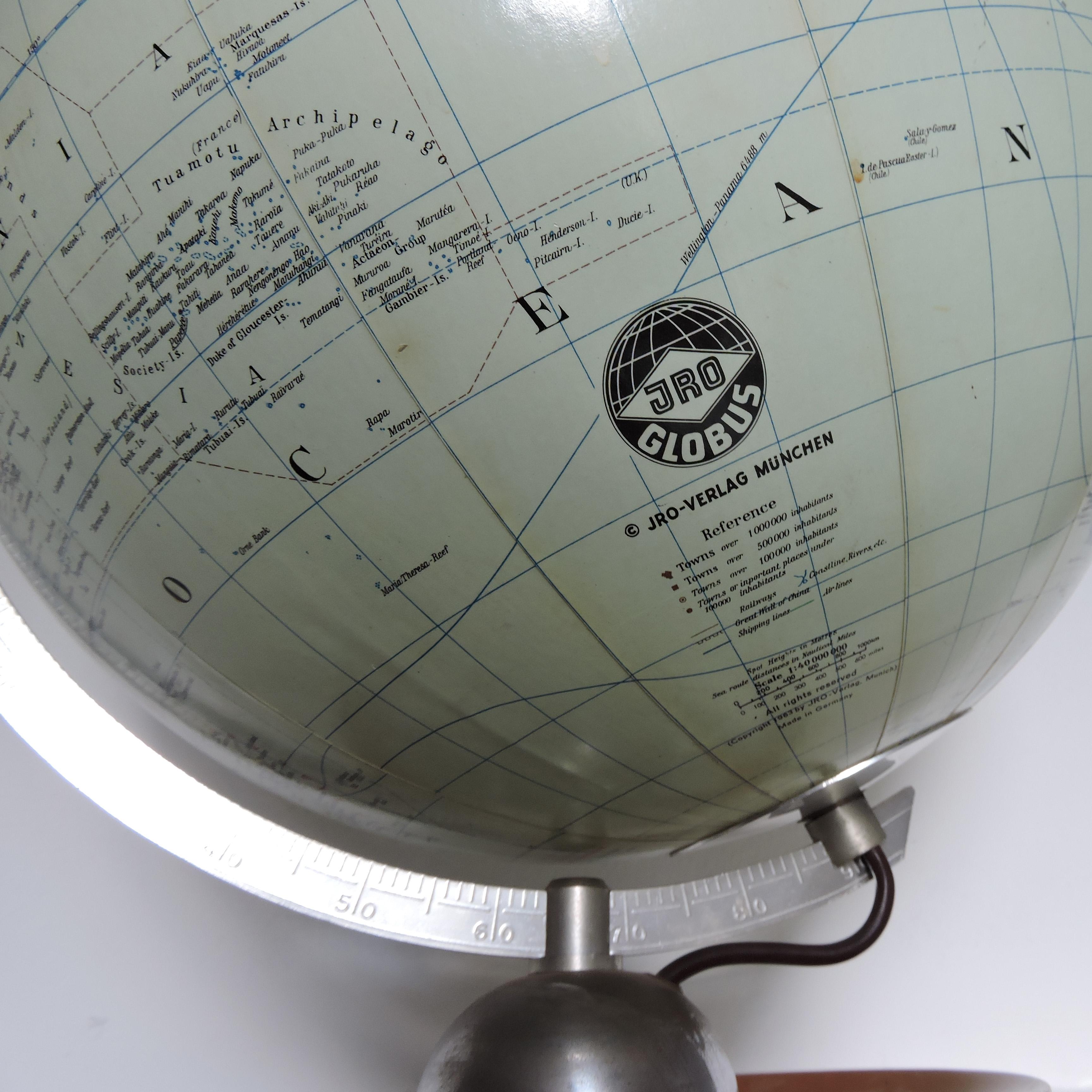 An illuminated globe that dates 1963 by JRO Globus.
 