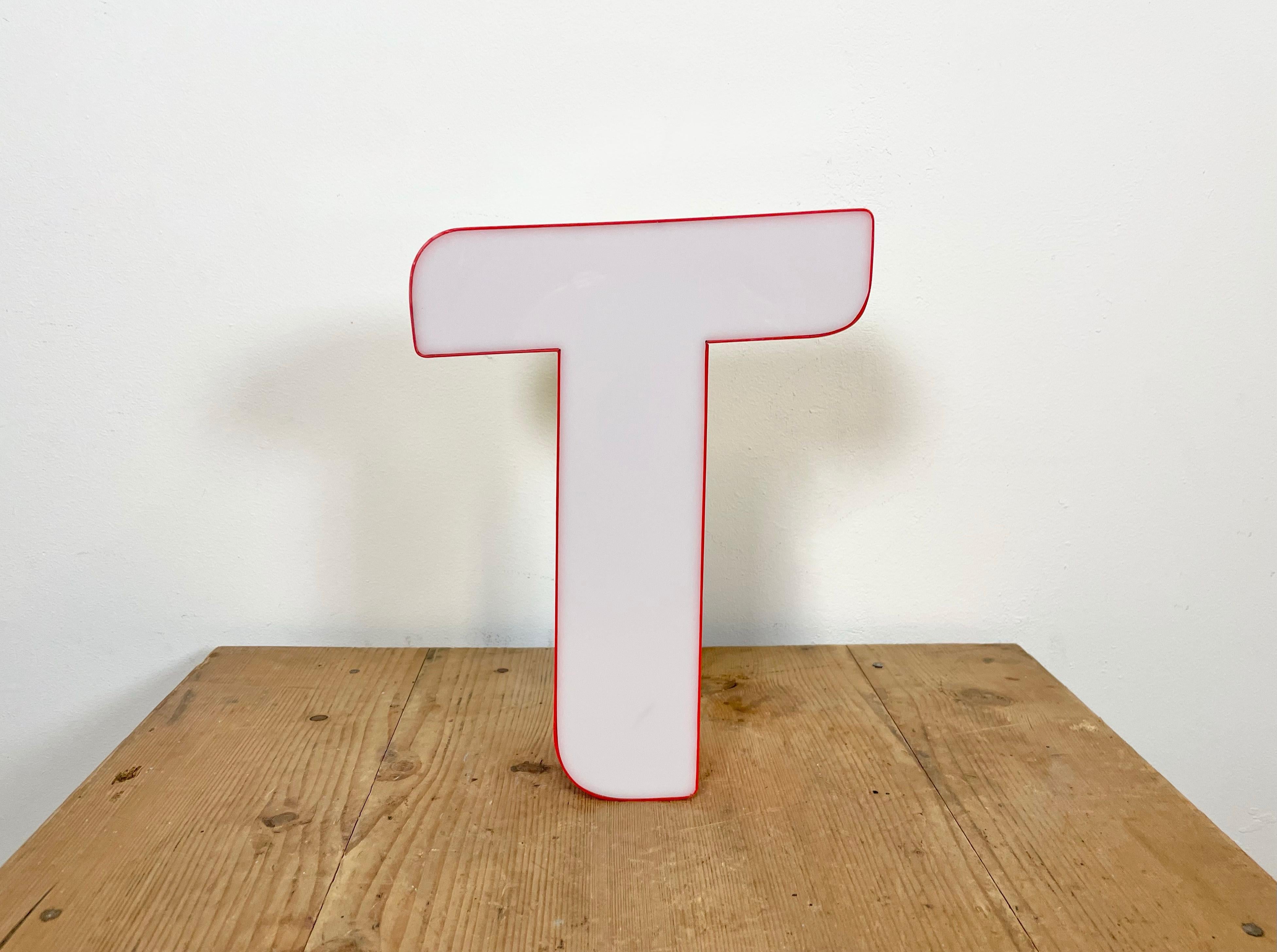 This vintage industrial red plastic illuminated letter R was made in Italy during the 1970s and comes from the old advertising banner. The letter can be used as a table lamp or wall lamp.The weight of the letter is 1 kg.