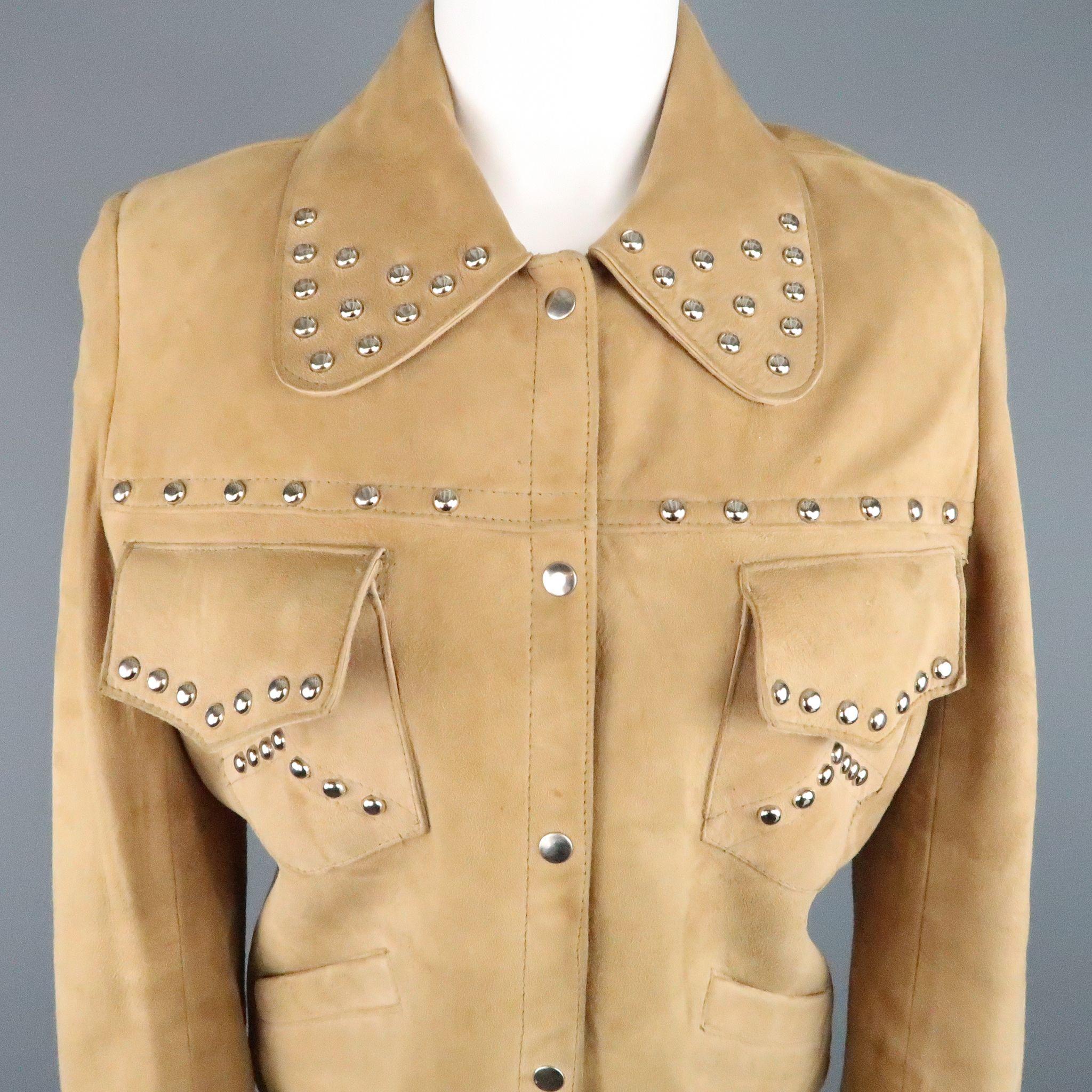 Vintage I.MAGNIN cropped jacket comes in a soft tan suede and features an oversized collar with silver tone studs, patch flap pockets. slit pockets, snap front closure, and tab cuffs. Wear throughout suede. As-Is.
 
Fair Pre-Owned Condition.
Marked: