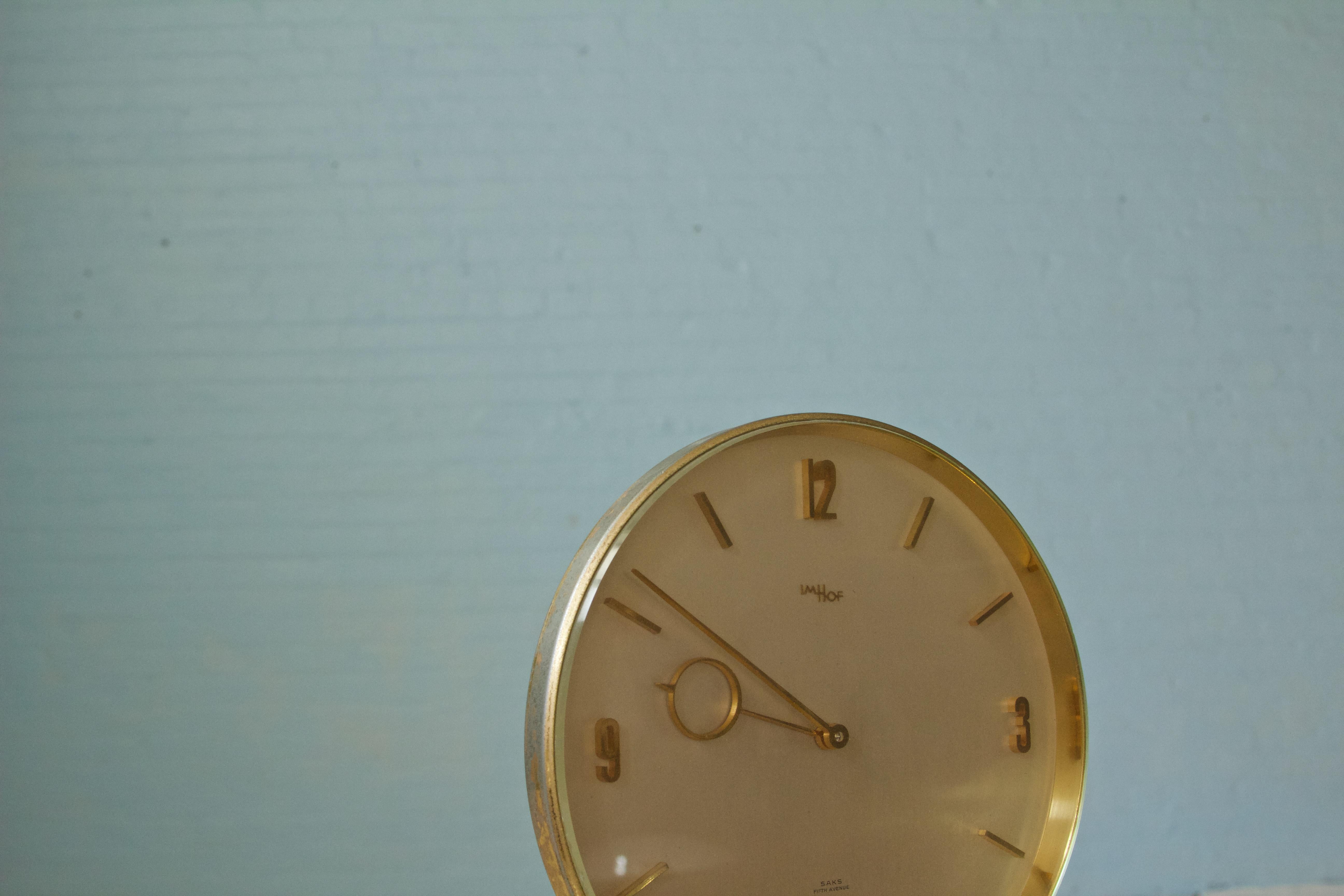 Mid-20th Century Vintage Imhof for Saks Fifth Avenue Circular Brass Desk Clock Switzerland, 1960s For Sale
