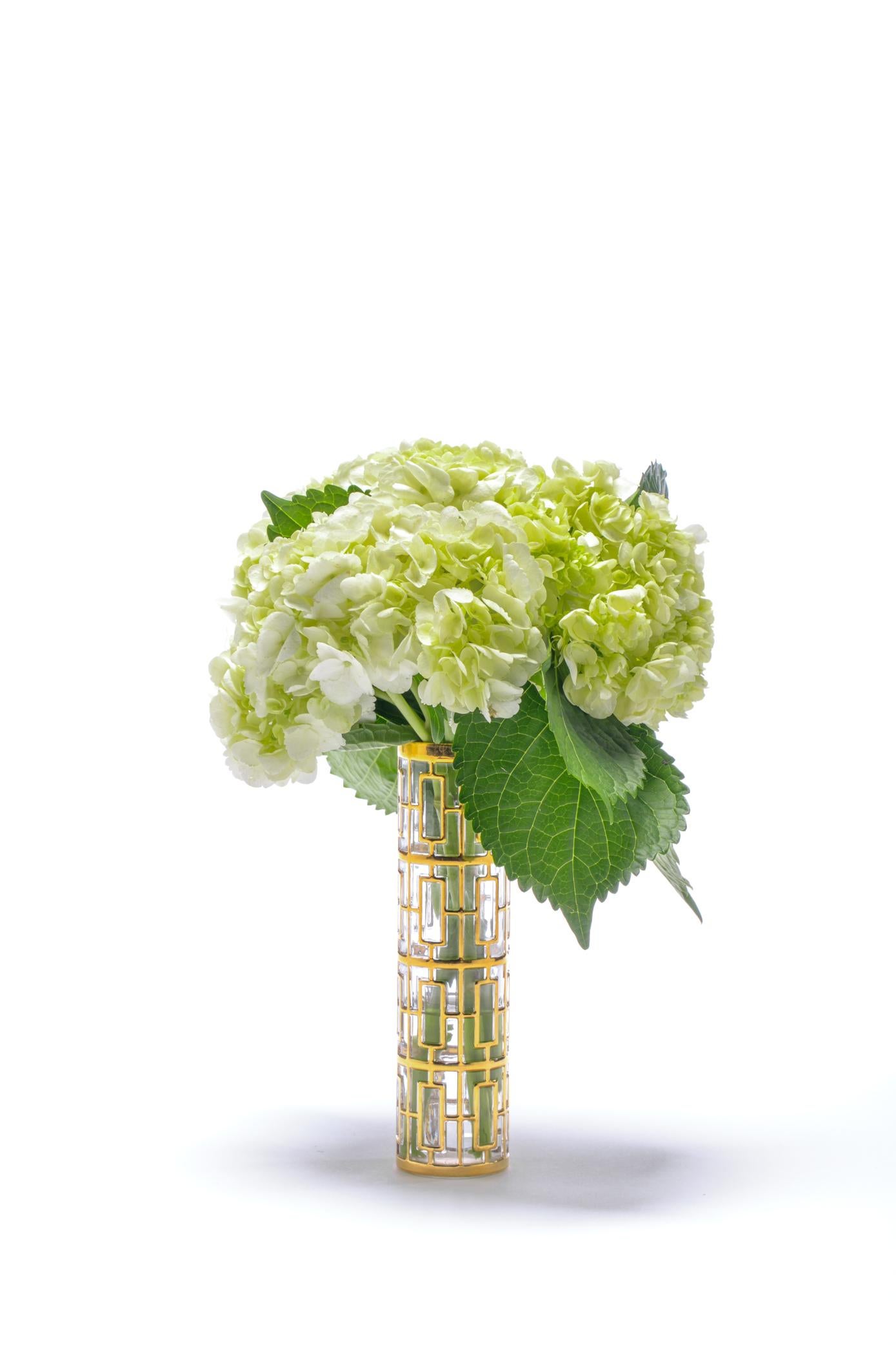 Delivering high style and sophistication since the 60s, this unique and uplifting vase is of the one of the most celebrated Mid Century Modern glassware patterns of the time and into today. The best of times. Vintage top of the line chic. This vase