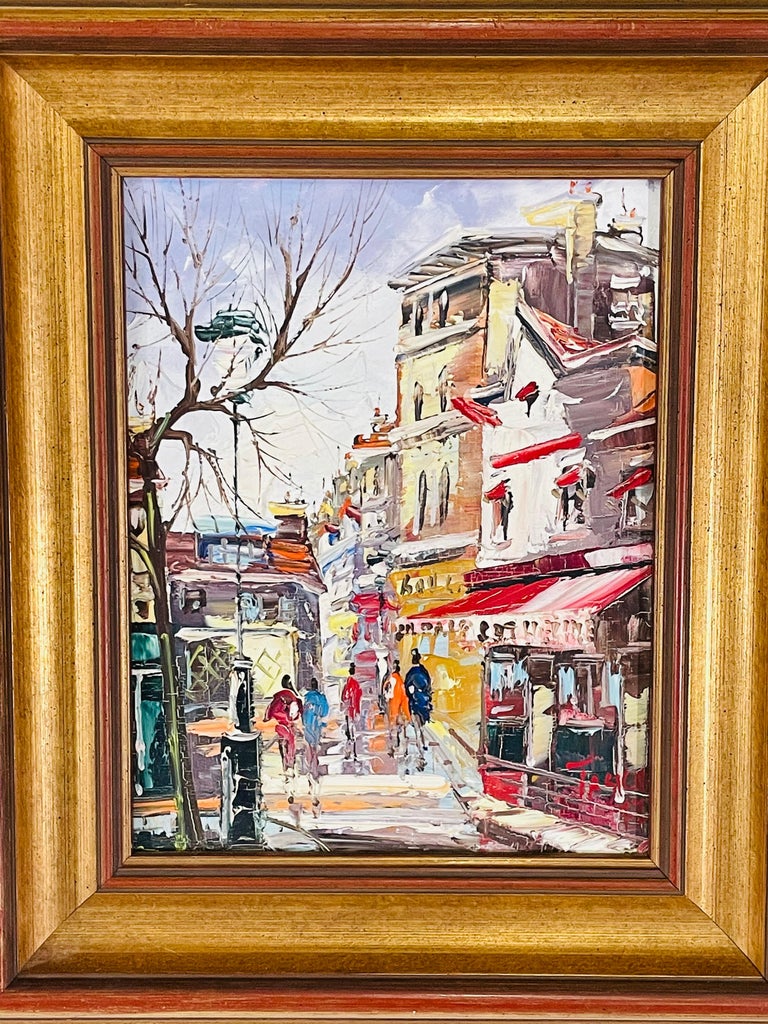 An elegant vintage impressionist oil on canvas painting signed by artist Tasica -1977. The painting features a street scene in the city. It is beautifully framed in a wood frame painted in gold and brown.

Dimensions: 11.5