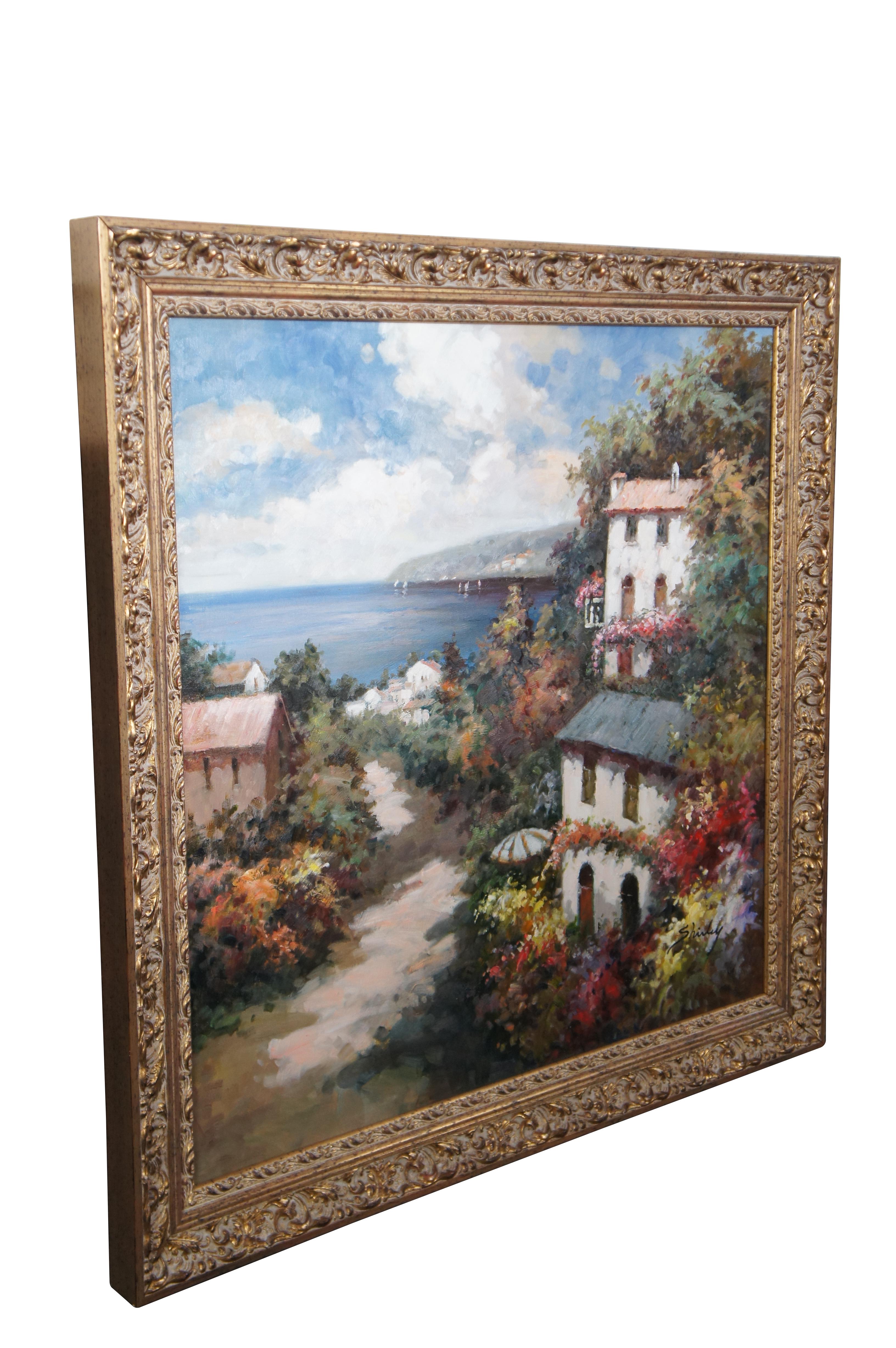A large impressionist seascape or harbor view in Tuscany.  Signed Shirley, circa late 20th century.  The oil painting is on canvas and features a view down the hillside on a crisp afternoon with floral sprays amidst houses with a view towards the