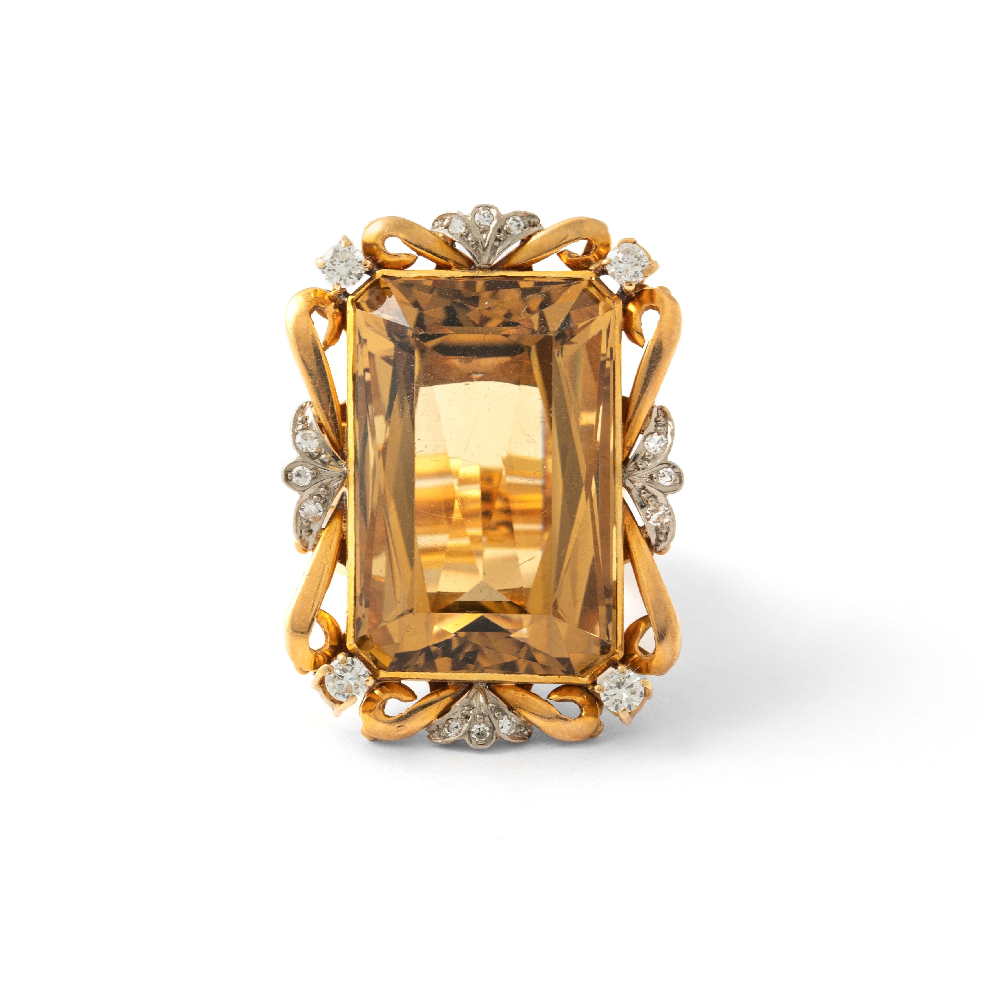 Impressive Citrine Diamond Yellow Gold Ring.
Circa 1950.490
Total length: approx. 3.60 centimeters.
Total width: approx. 2.60 centimeters.

Ring size: 60 / 9.25 US
Total weight: 32.53 grams.
