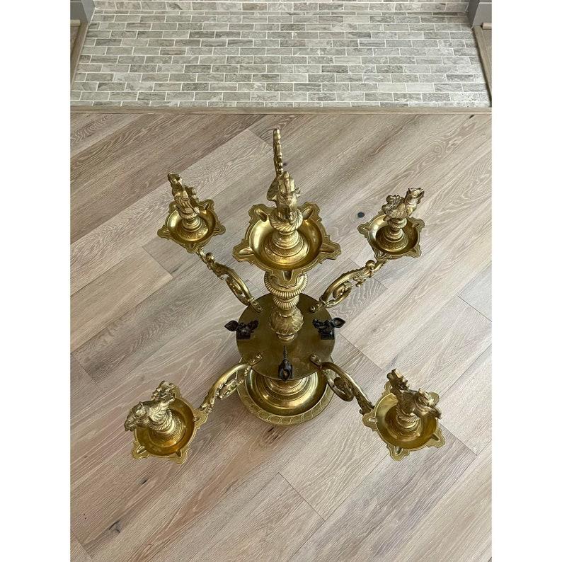 the iconic nachiarkoil lamp is also called