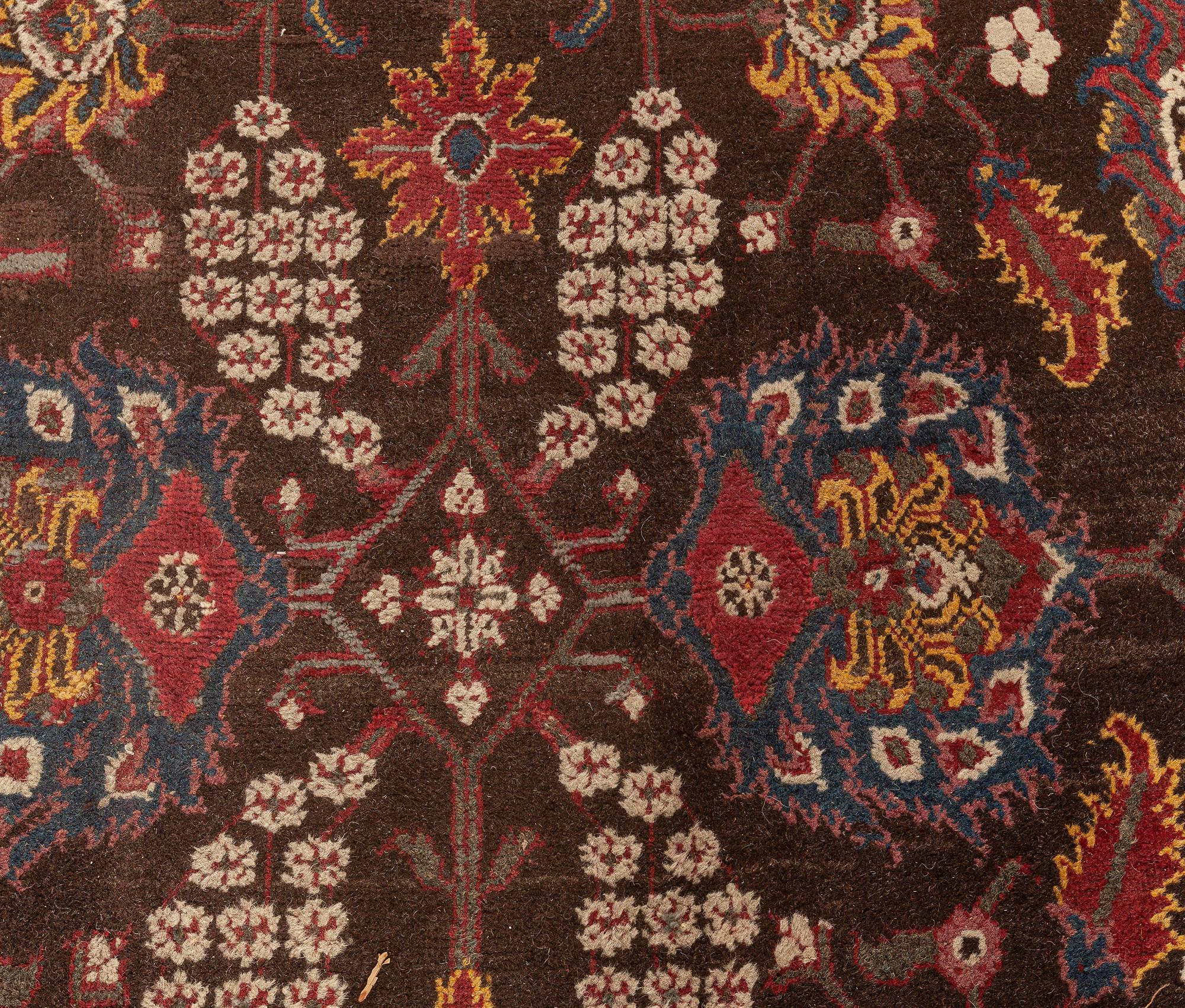 Vintage Indian Agra brown, red, blue, ivory handmade wool carpet
Size: 11'10