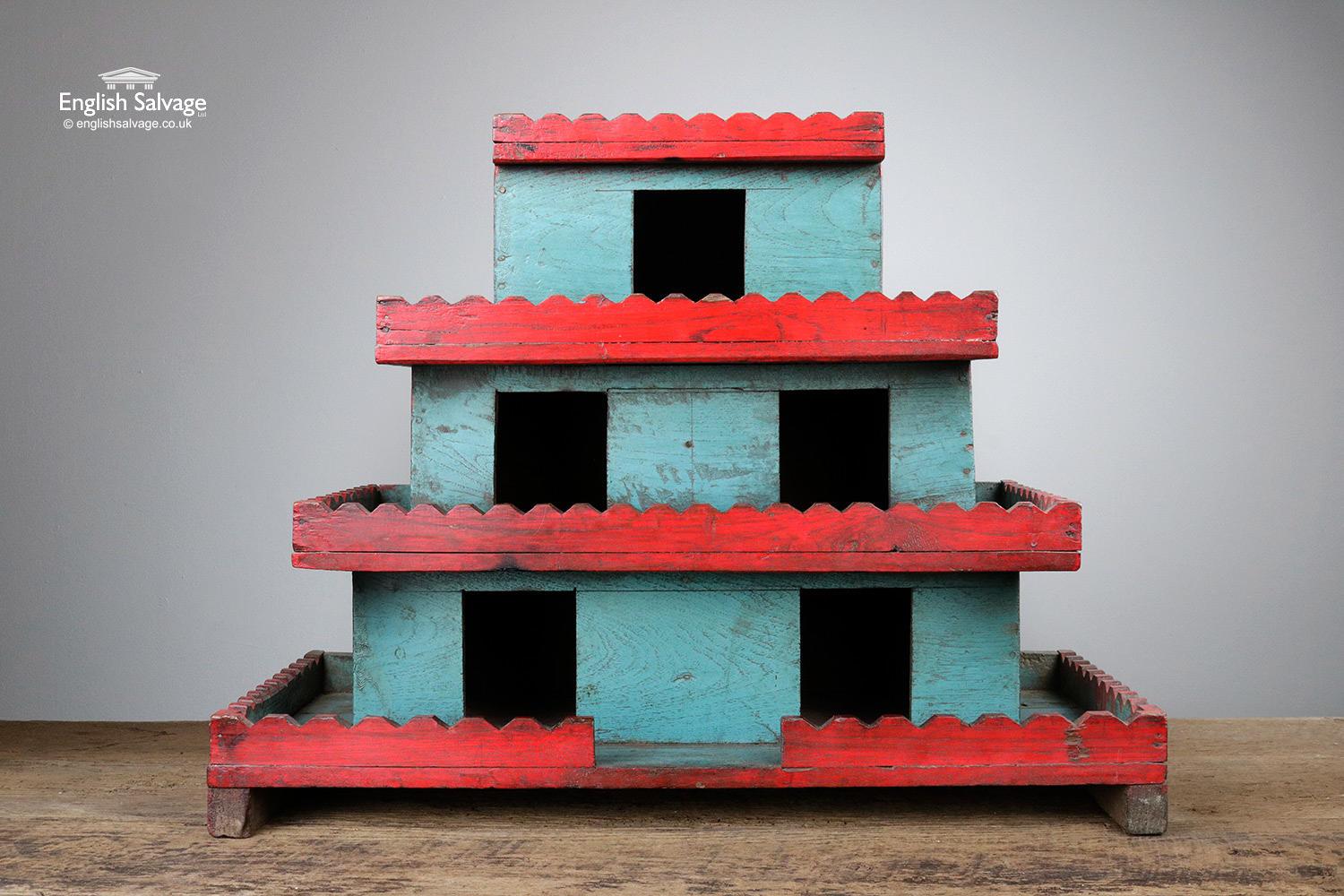Vintage Indian hardwood model of a house painted blue with red parapet detailing. Would make a lovely unique display stand. The bottom tier is 61cm wide x 30cm deep, the middle tier is 51cm wide x 27.5cm deep and the top tier is 26.2cm wide x 22cm