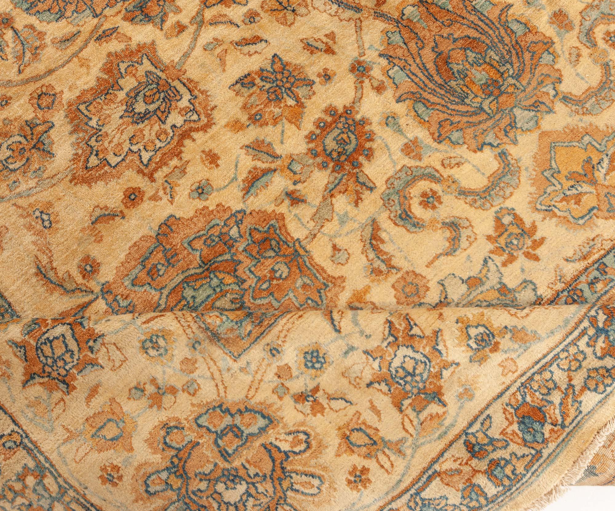 Vintage Indian Botanic handmade wool rug
Size: 12'10