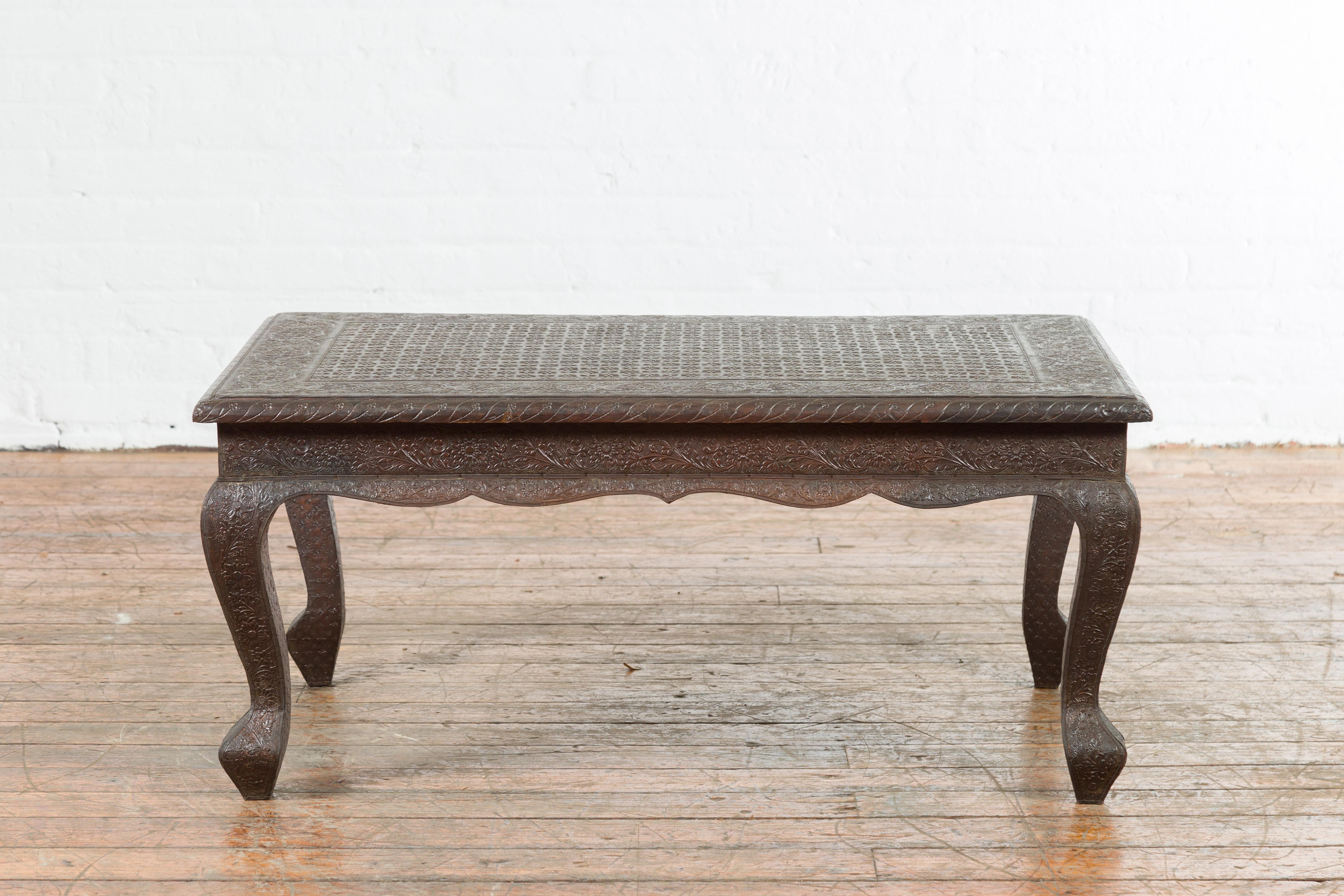 Vintage Indian Coffee Table with Embossed Floral Design and Cabriole Legs For Sale 4