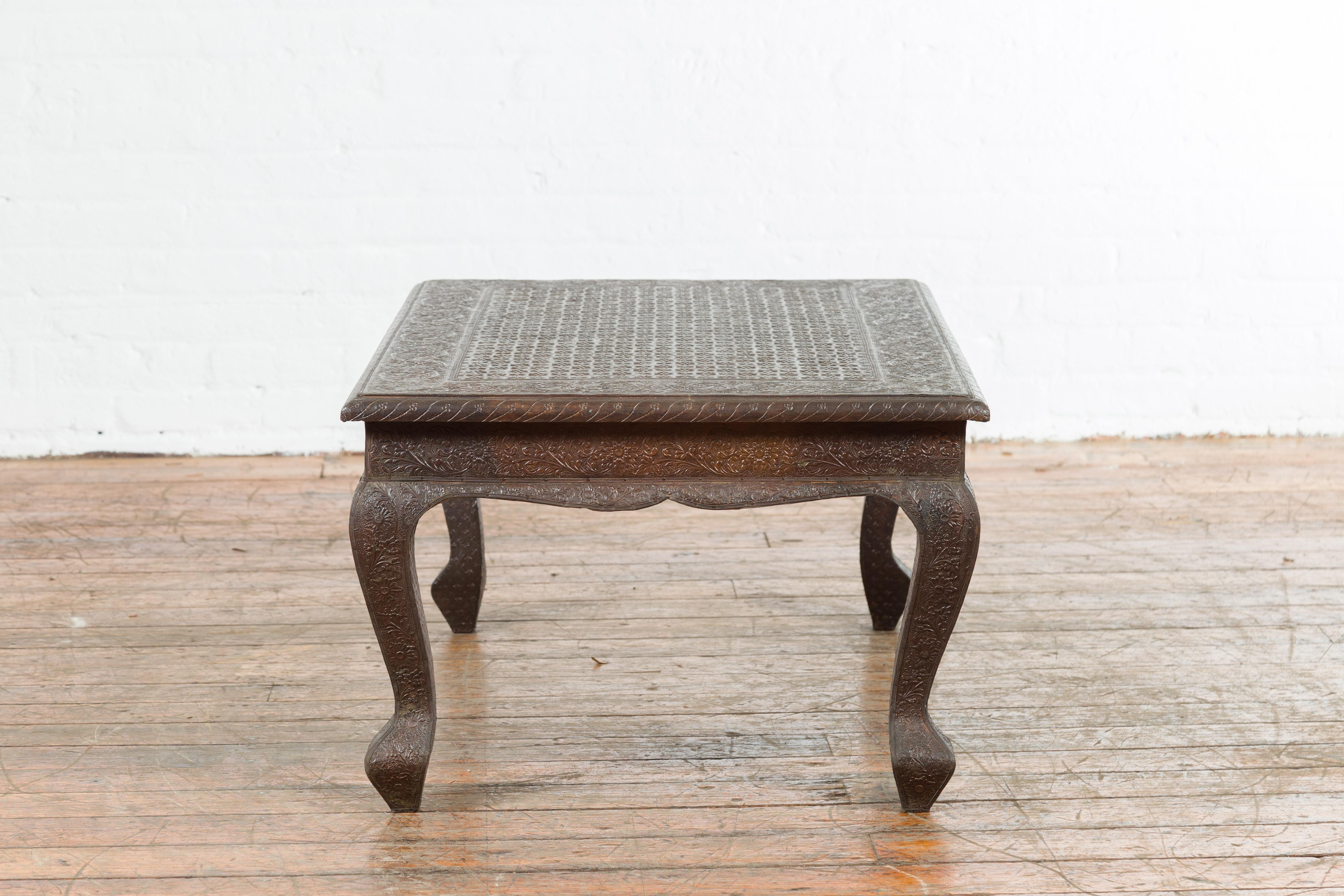 Vintage Indian Coffee Table with Embossed Floral Design and Cabriole Legs For Sale 5