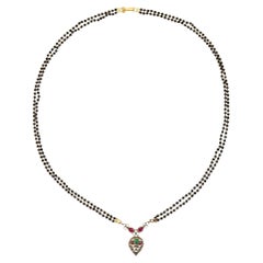 Collana indiana d'oro, diamante, rubino, smeraldo, onice, vintage