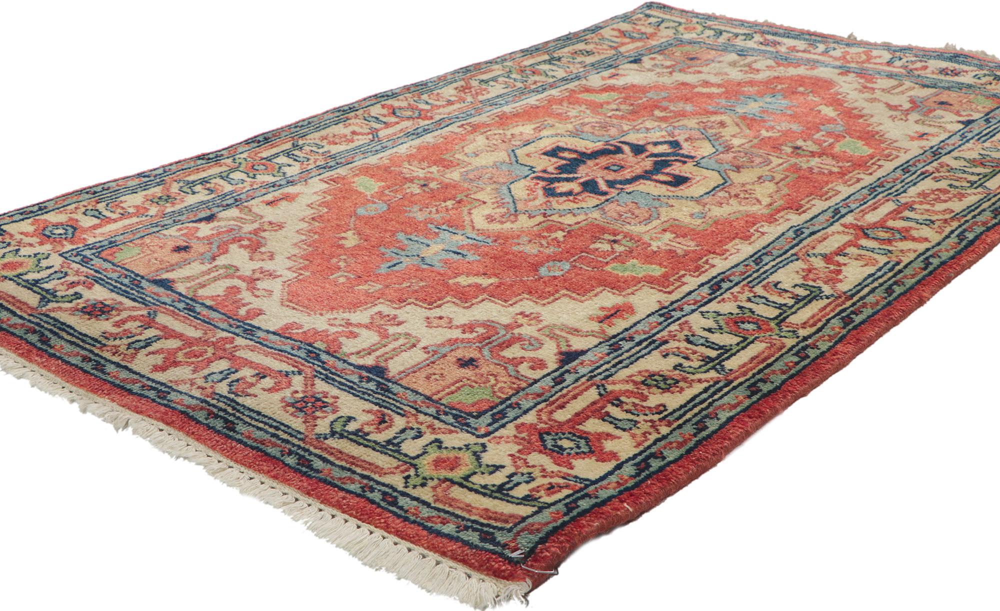 78348 Vintage Indian Heriz Rug 03'01 x 05'00. Warm and inviting with a classic style, this hand-knotted wool vintage Indian Heriz rug charms with ease. The abrashed red field features a concentric medallion surrounded by an allover geometric