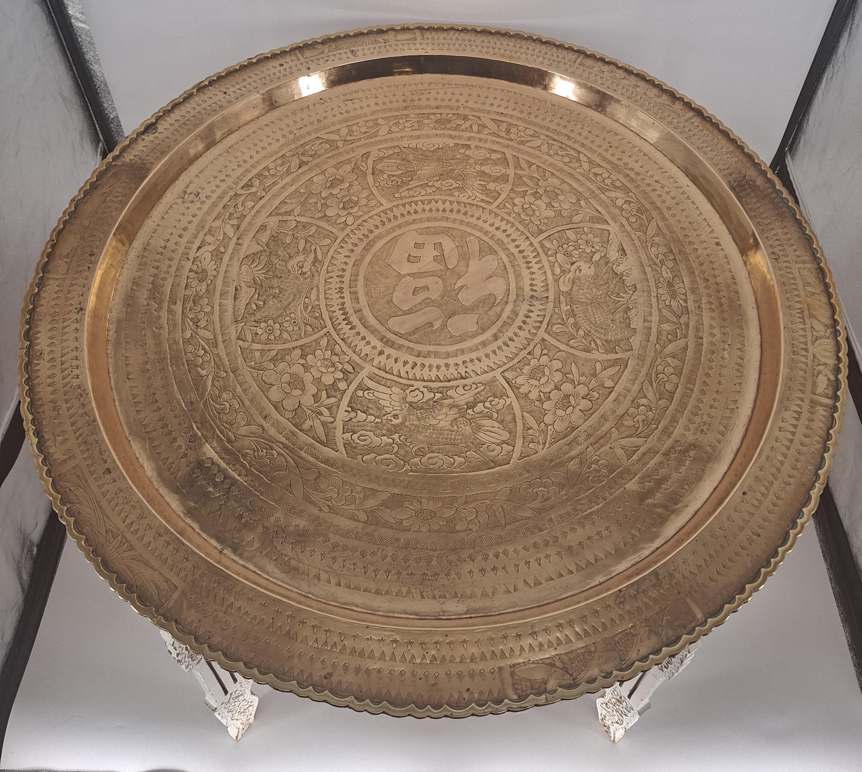 Vintage Indian Incised Brass Tray on Anglo-Indian Wood-carved Folding Stand In Excellent Condition For Sale In San Francisco, CA