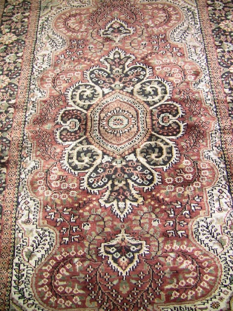 Really nice rectangular, medium sized vintage floor rug.

Made of pure silk in Northern India…..Kashmir …….. in the style of Persian rugs but made of luxurious silk.

Highly sought after!

Full of brown, green and white hues.

Early 20th